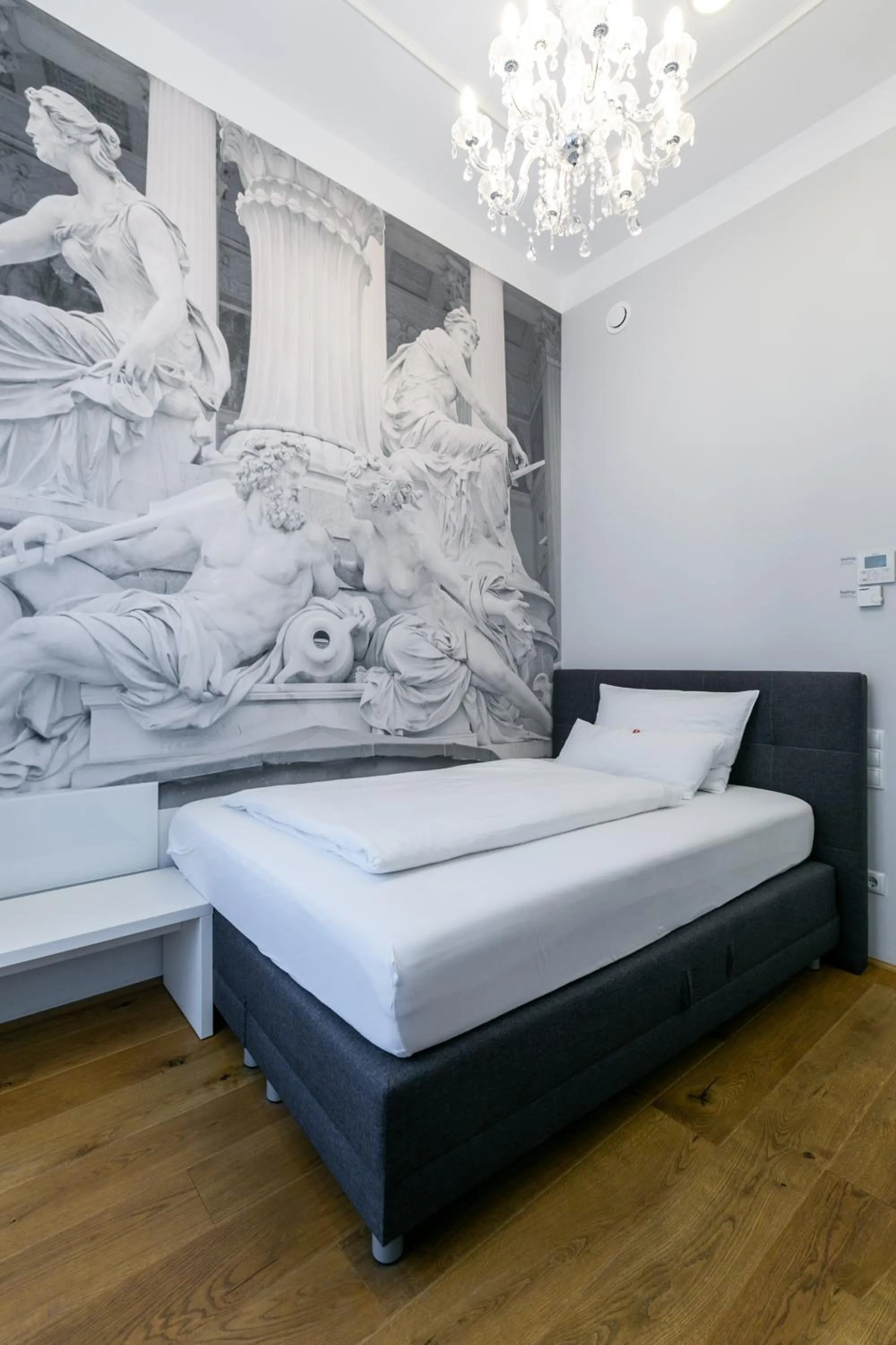 Photo of the whole room, Bed in Room 55