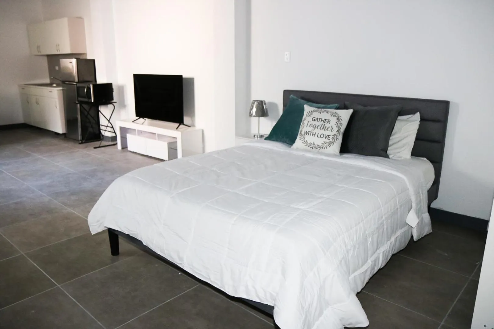 Photo of the whole room, Bed in Mavs Boutique At Ponce