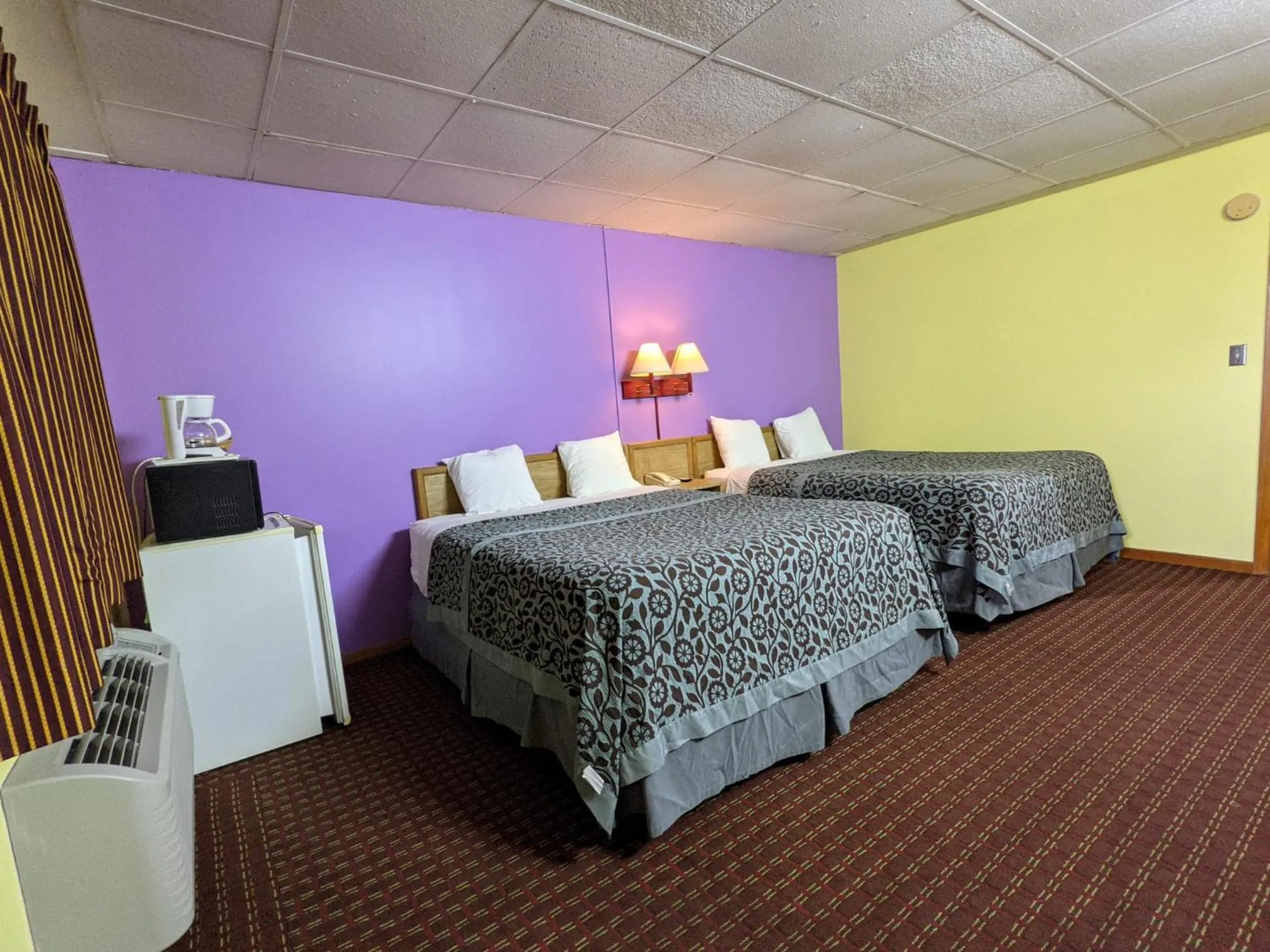 Bed in Great Plains Budget Inn