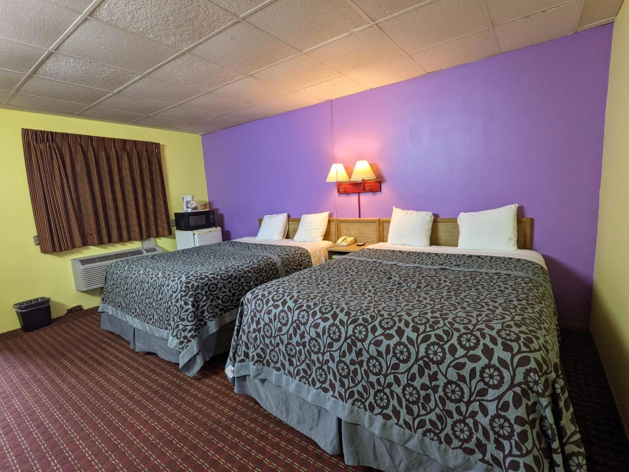Bed in Great Plains Budget Inn