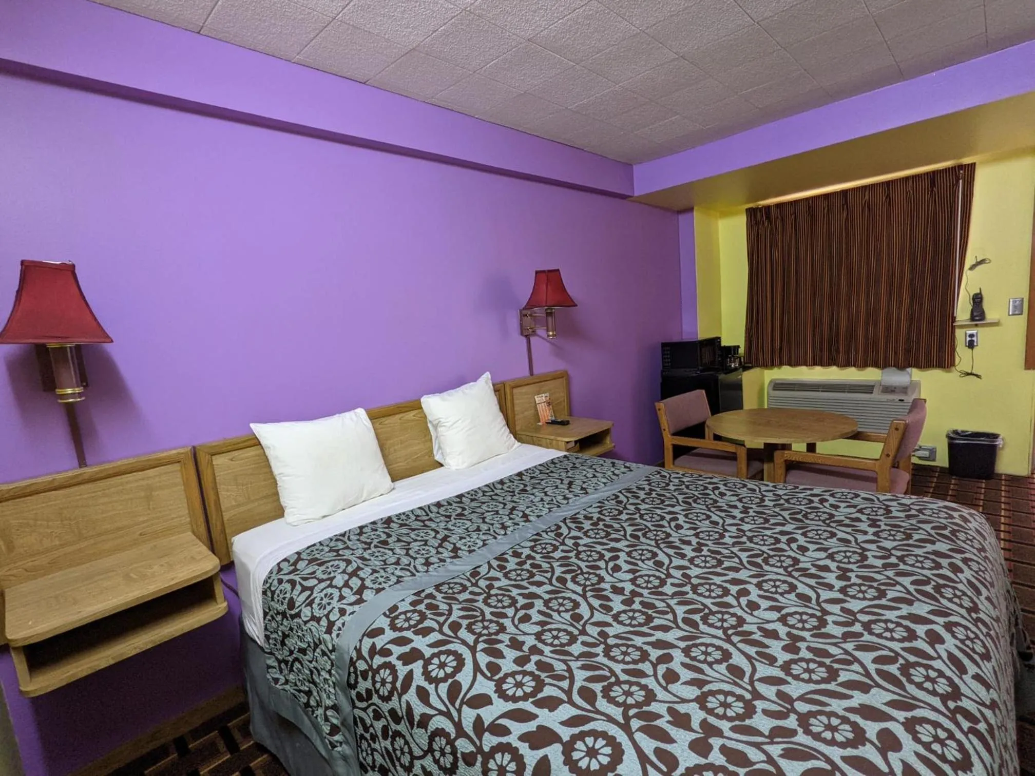 Bed in Great Plains Budget Inn