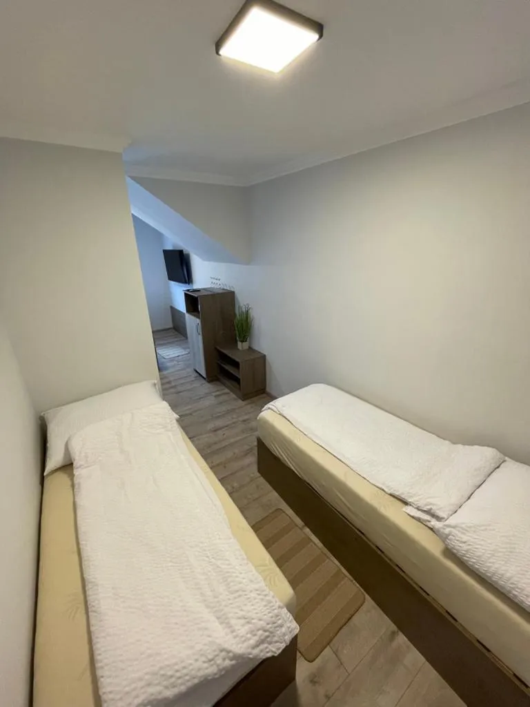 Bed in Kukorica Csárda Apartman