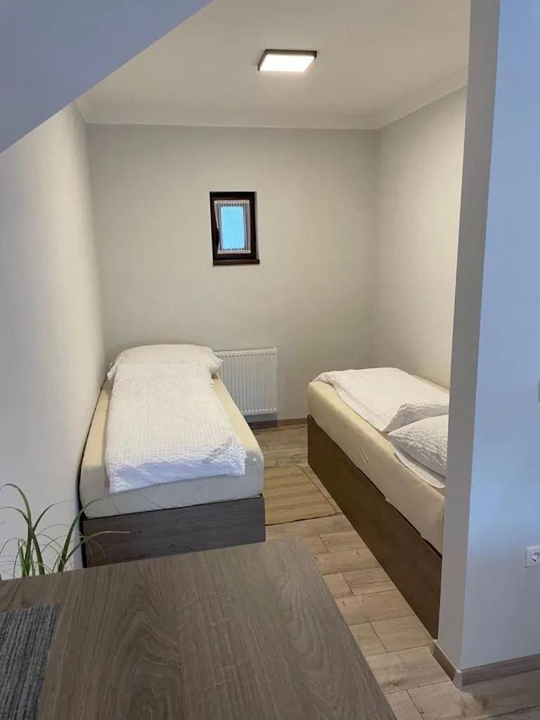 Bed in Kukorica Csárda Apartman