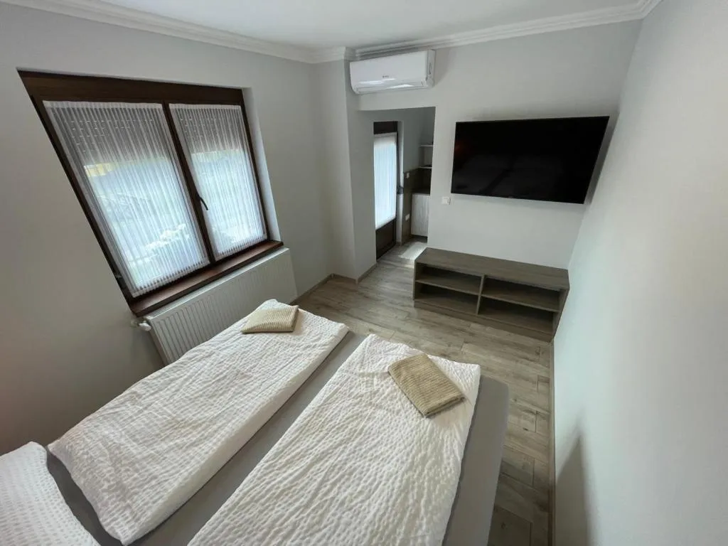 Bed in Kukorica Csárda Apartman