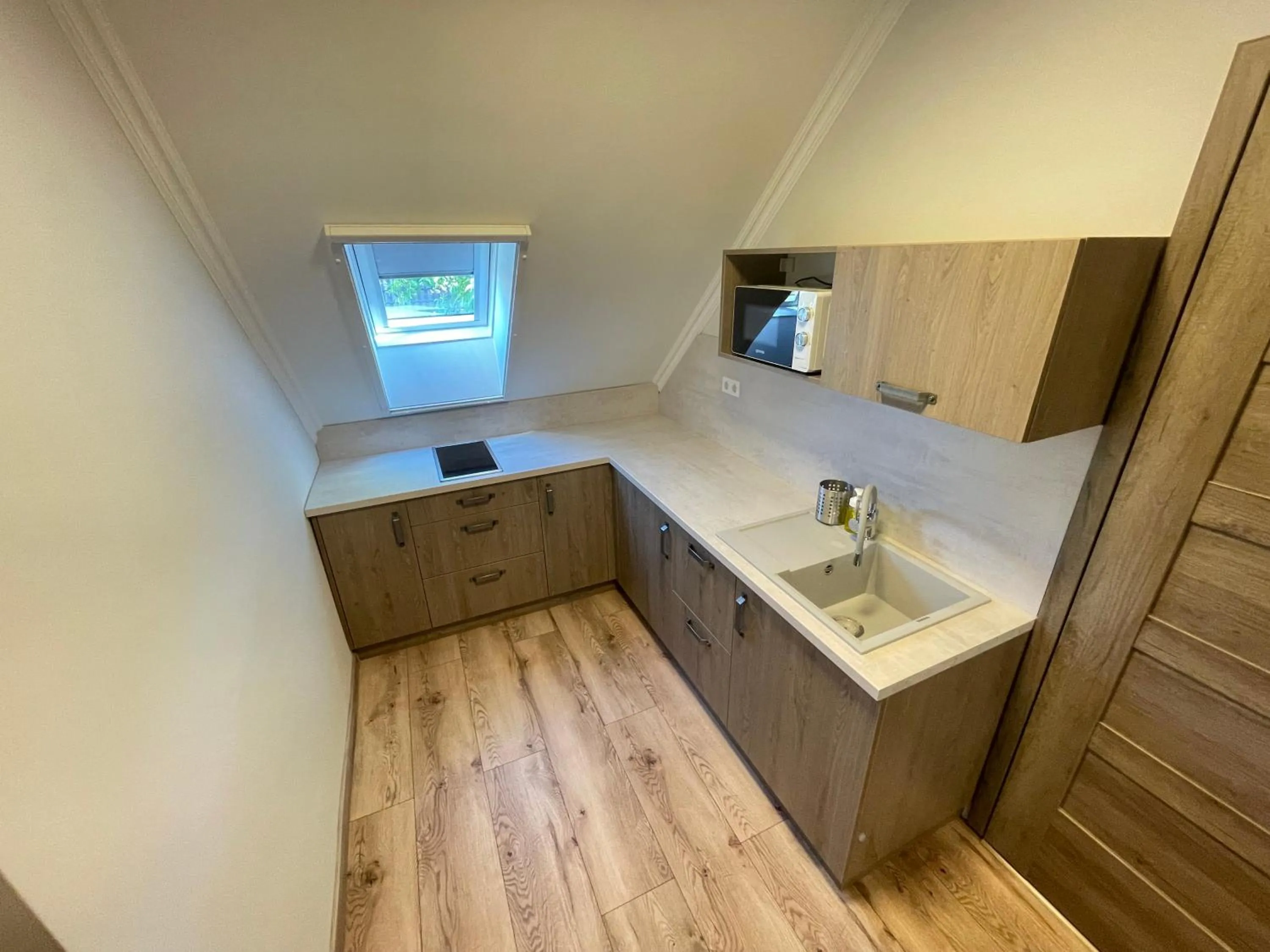 kitchen in Kukorica Csárda Apartman