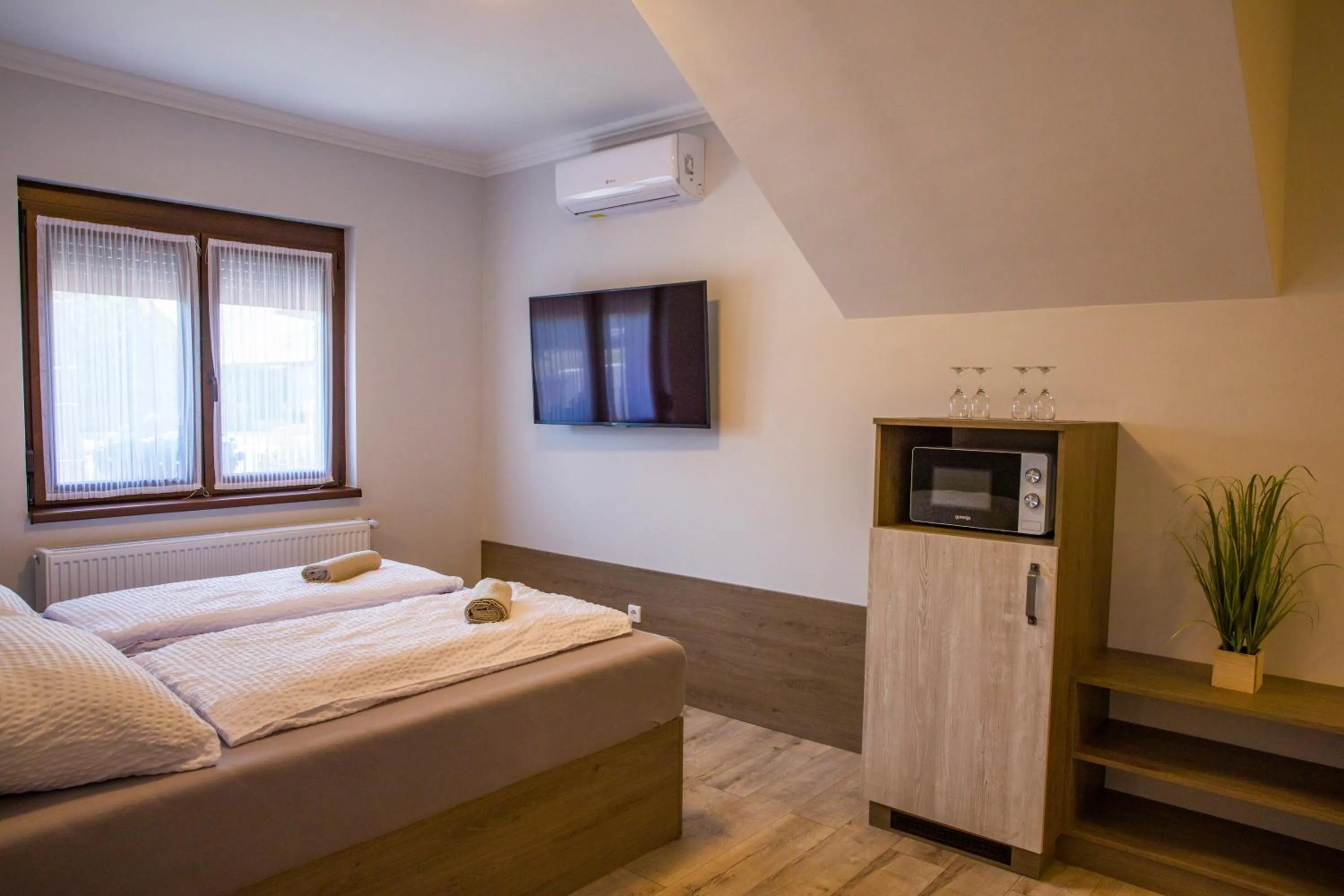 Bed in Kukorica Csárda Apartman