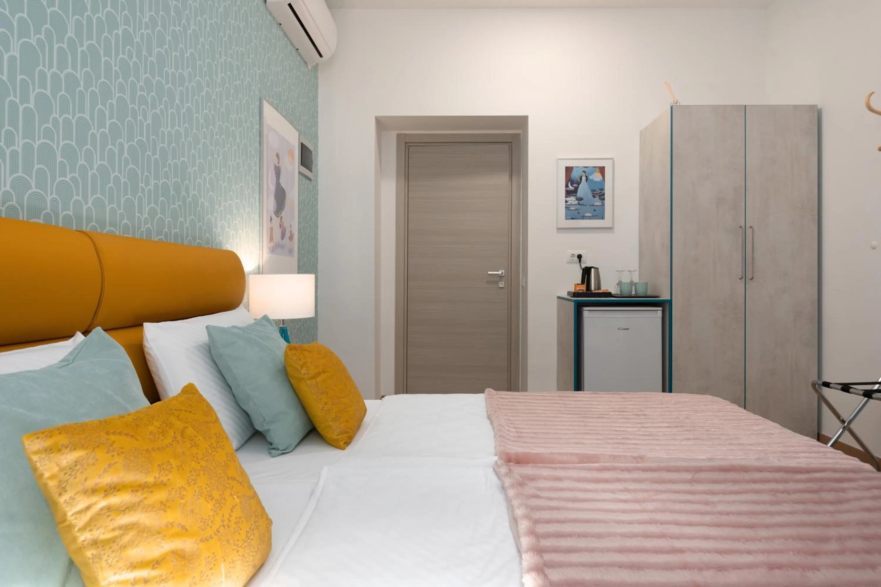 Bed in Polesana Rooms