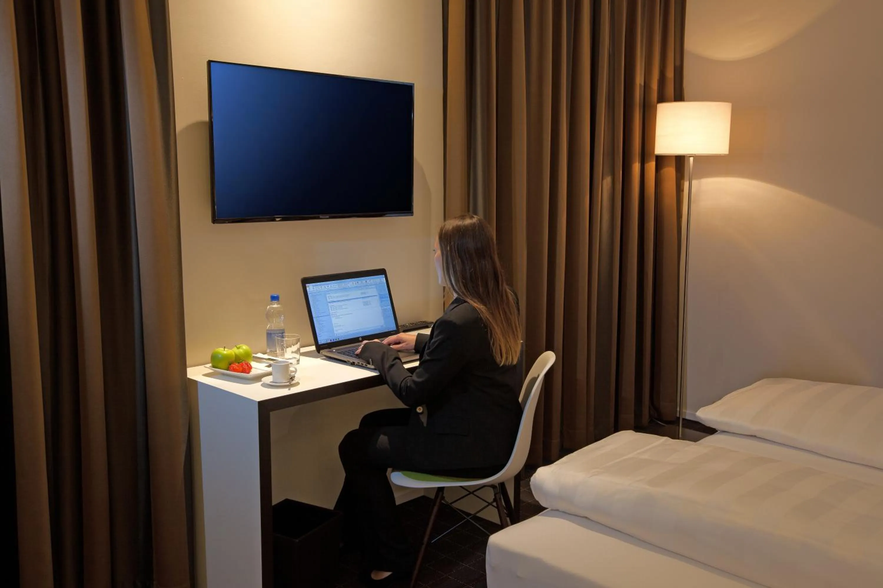 Seating area, Bed in b-smart motel Sevelen