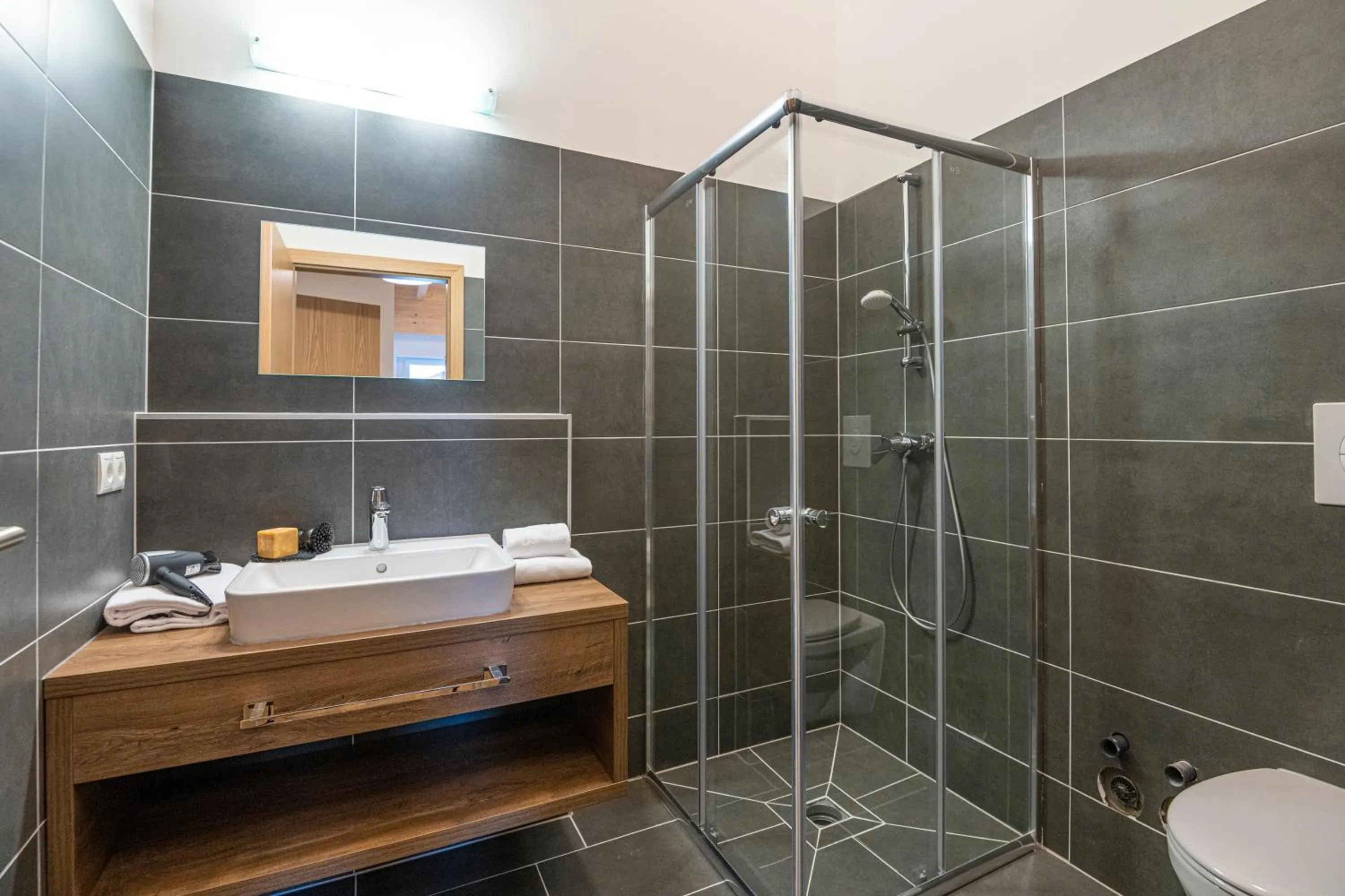 Bathroom in AlpenParks Hotel & Apartment Alpendorf