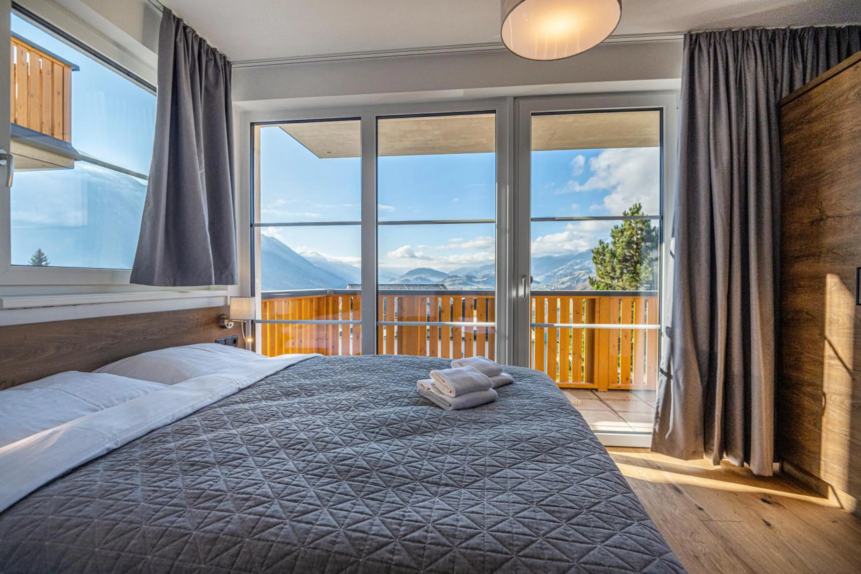 Photo of the whole room, Bed in AlpenParks Hotel & Apartment Alpendorf