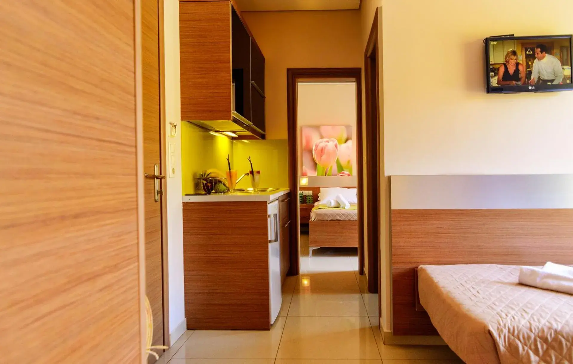 Kitchen or kitchenette, Bed in Relax Hotel Kitchen or kitchenette, Bed in Relax Hotel