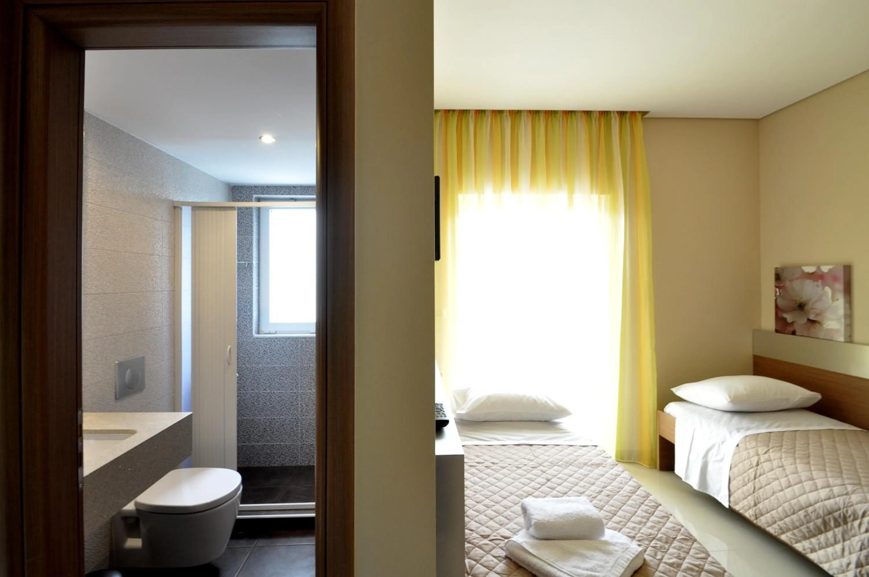 Toilet, Bed in Relax Hotel