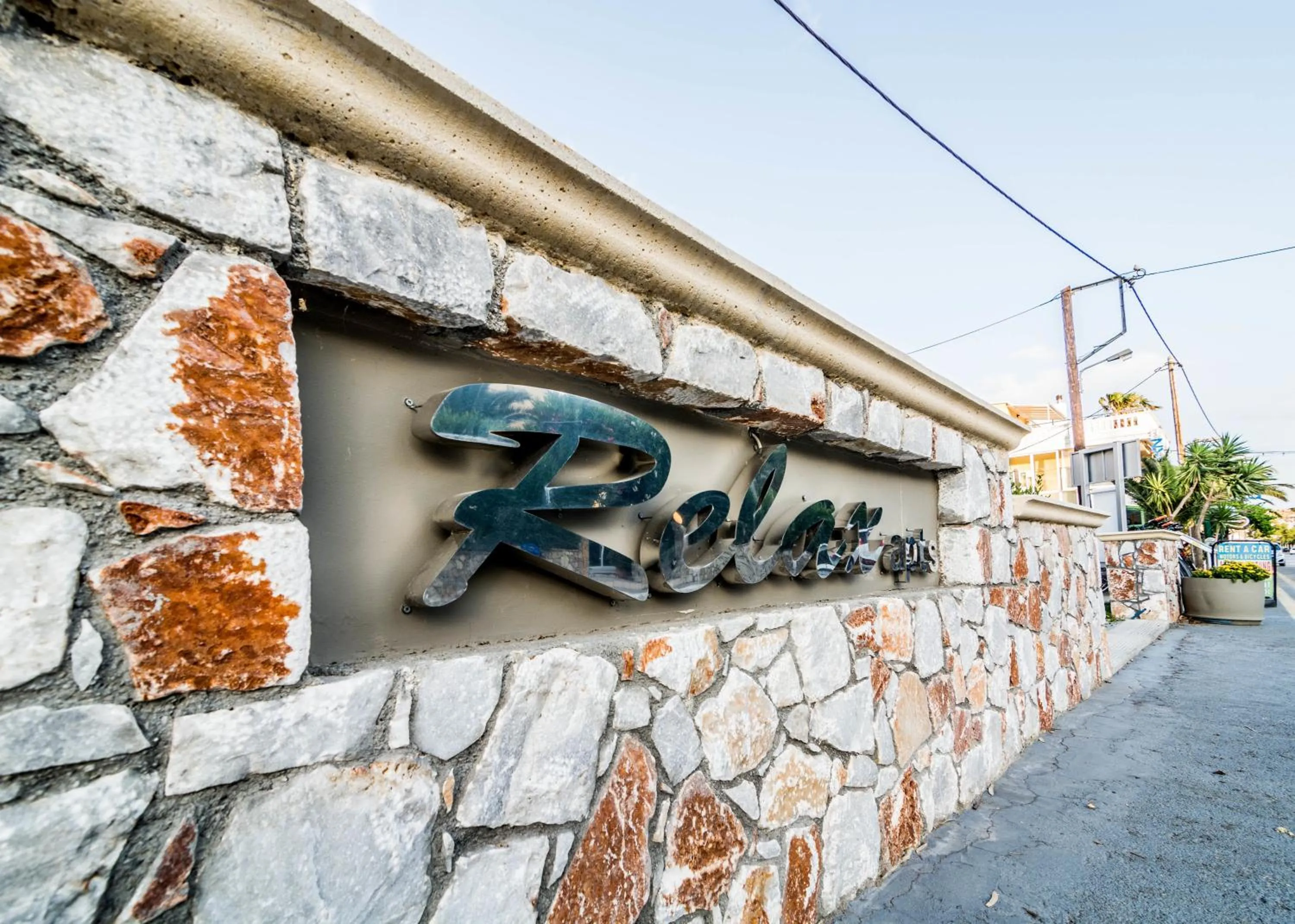 Property logo or sign in Relax Hotel