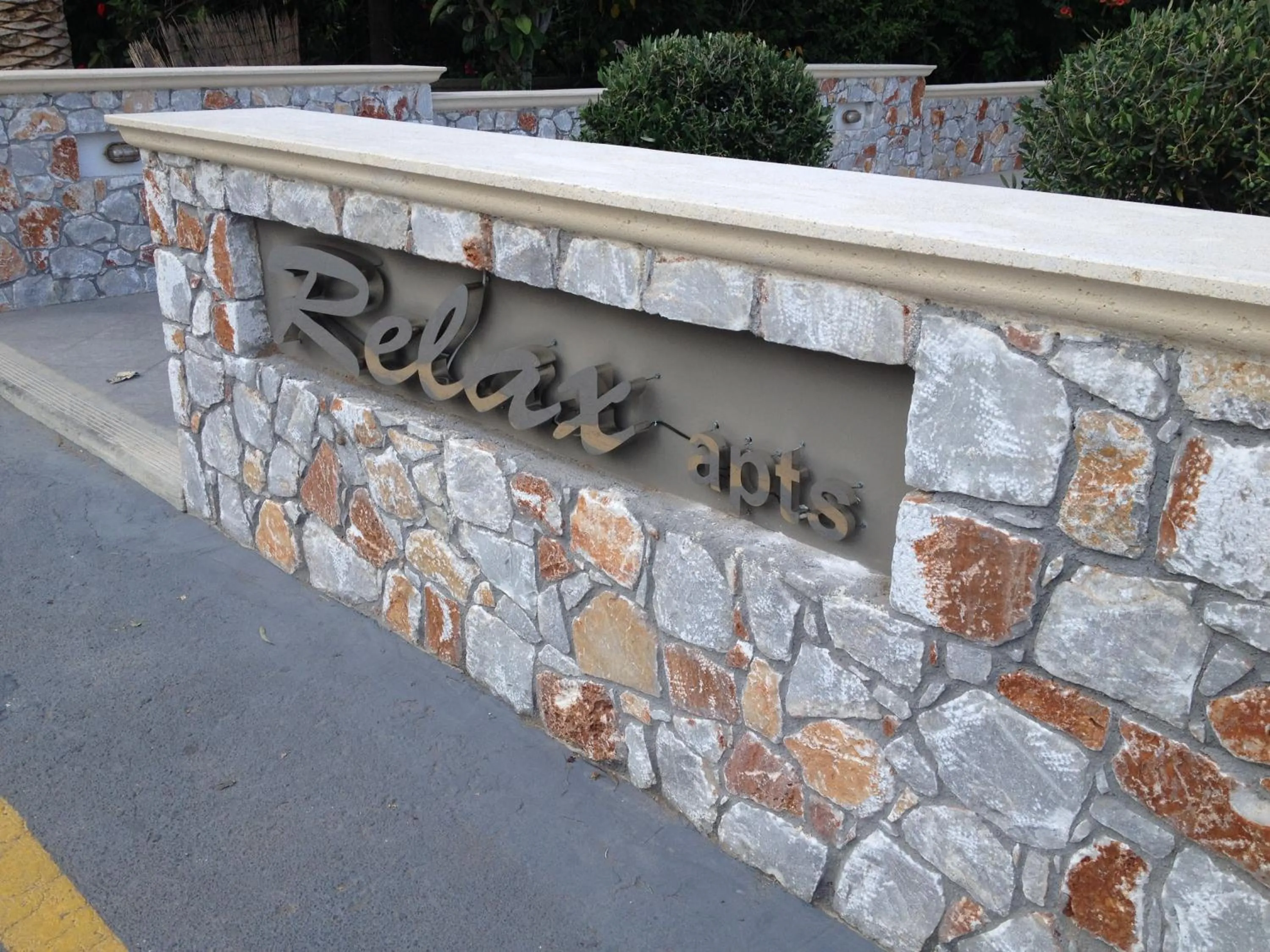 Property logo or sign in Relax Hotel