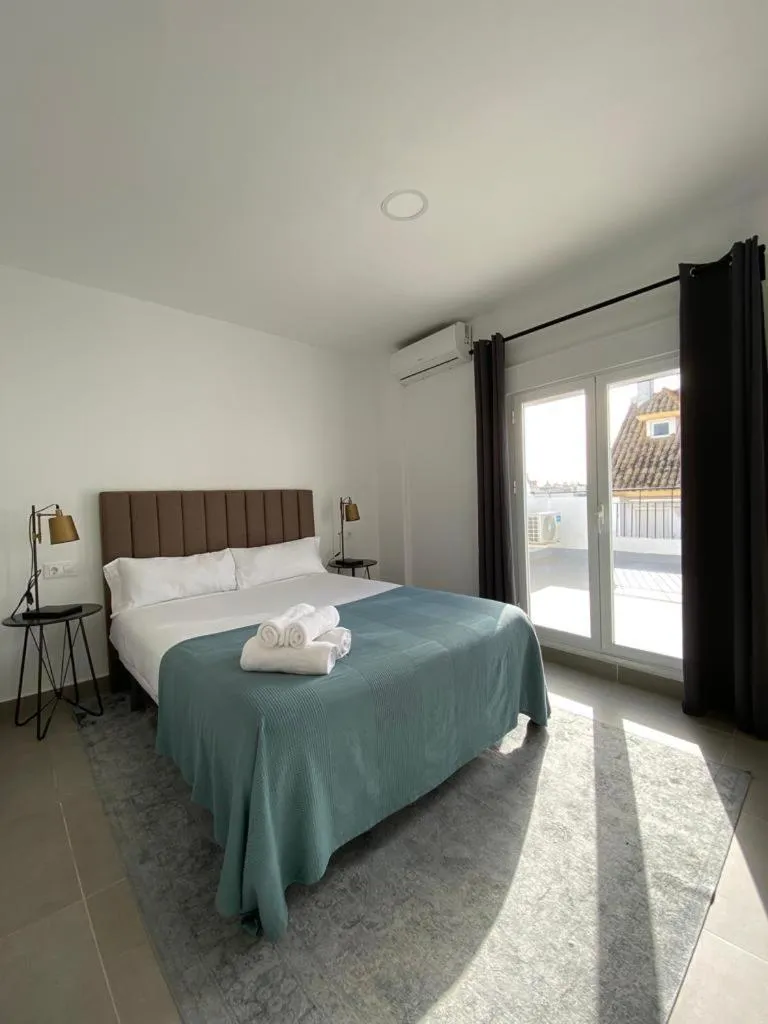 Bed in Villamarta Boutique Rooms