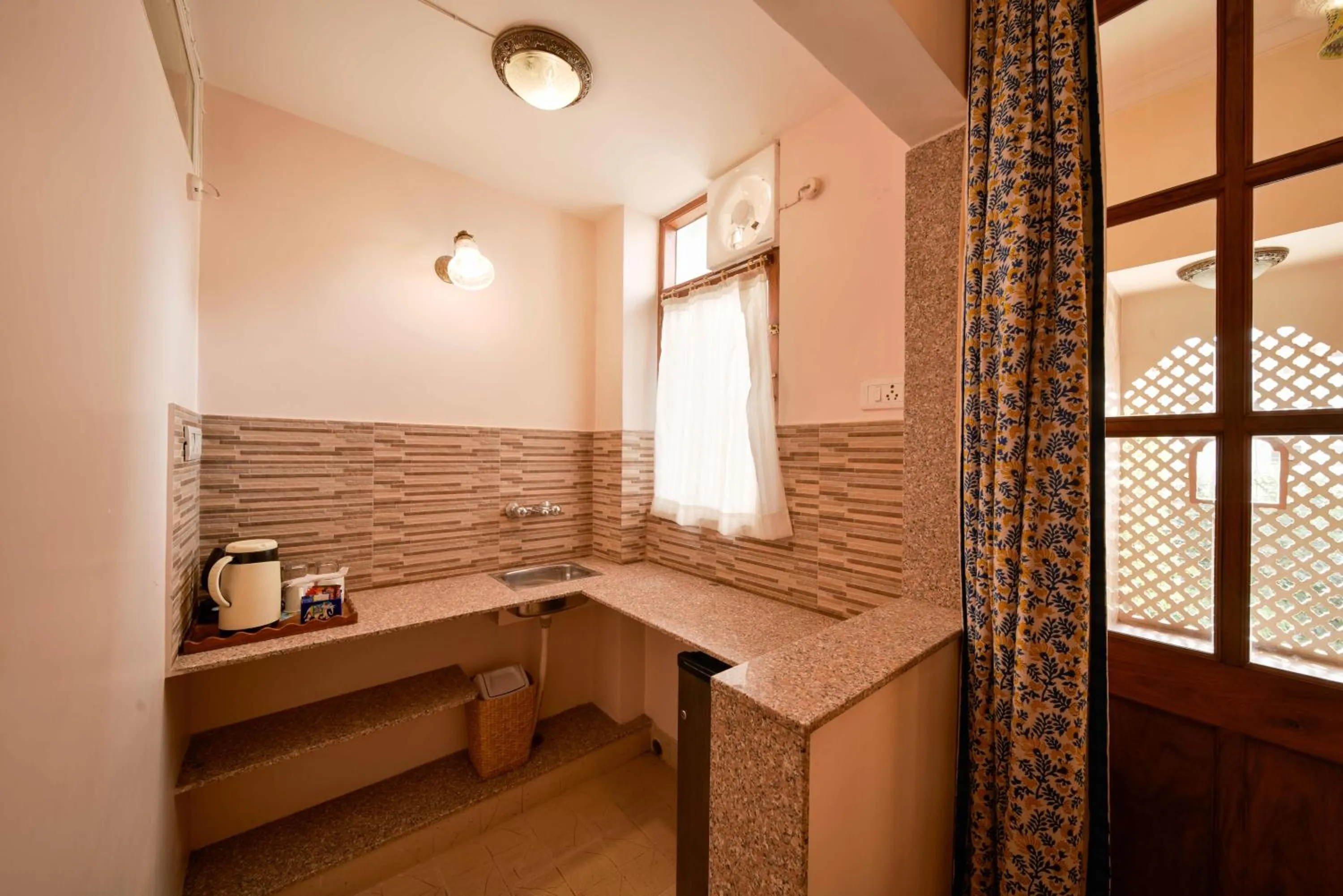Kitchen or kitchenette in Hotel Arya Niwas