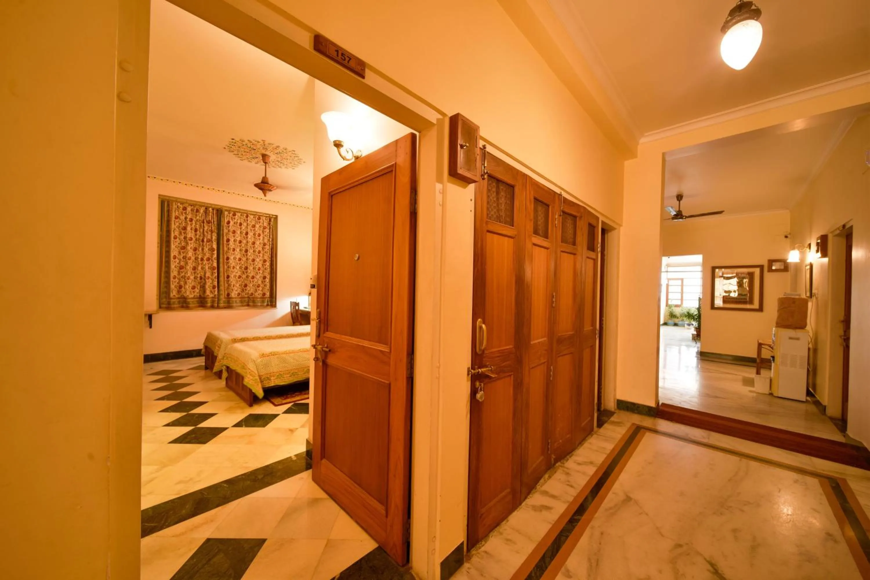 Bed in Hotel Arya Niwas