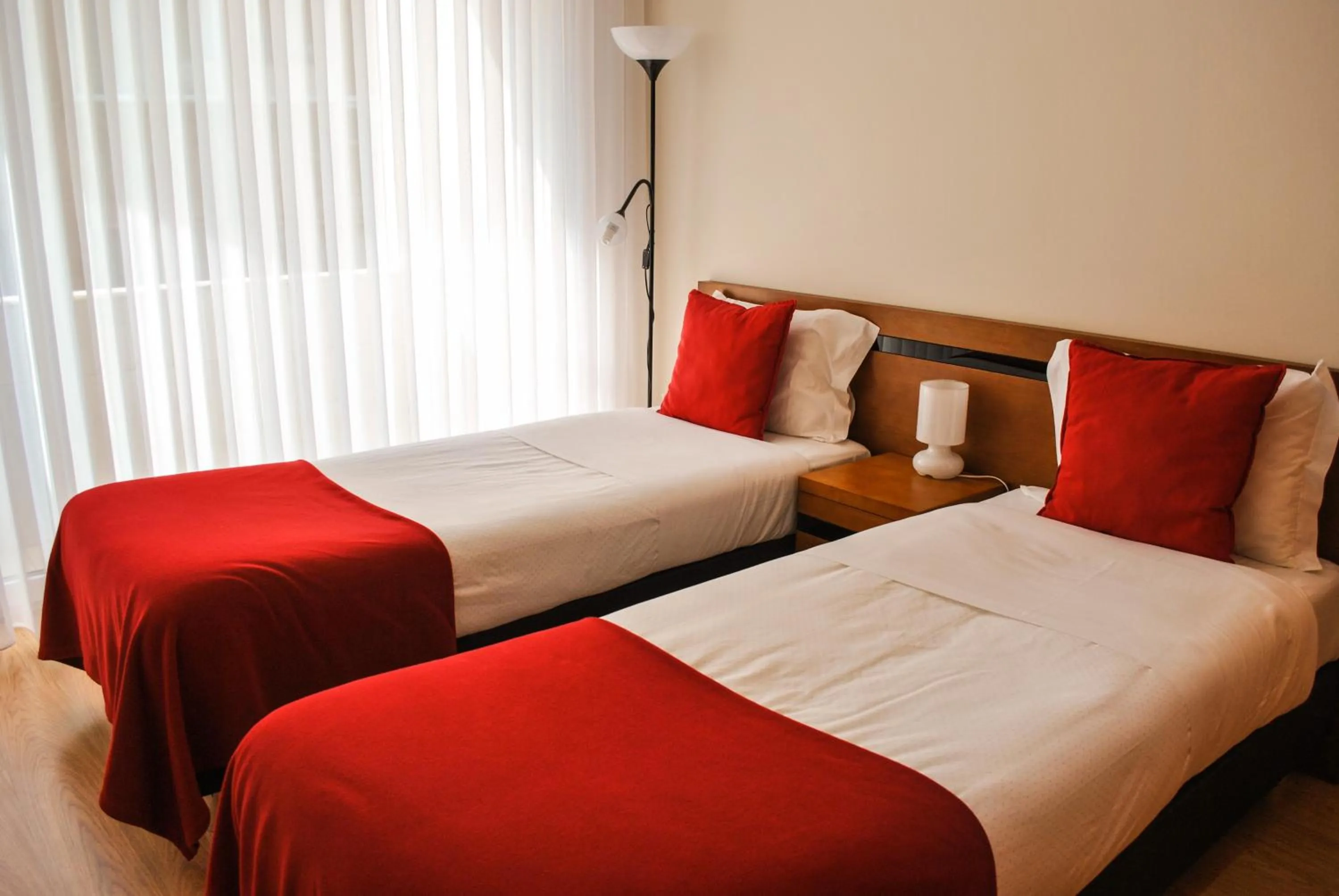 Bed in Apartamentos Portodouro - Santa Catarina