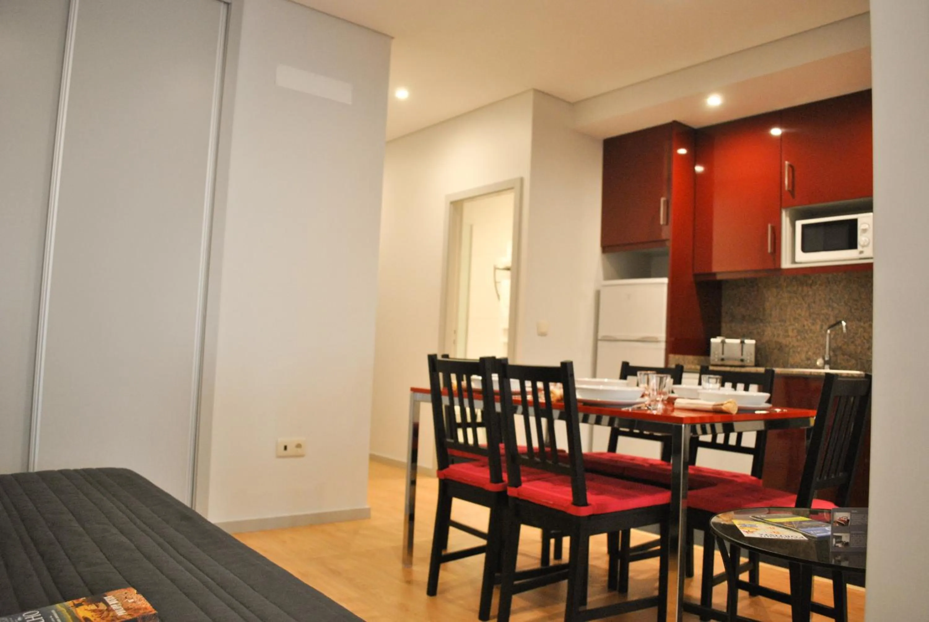 Kitchen or kitchenette in Apartamentos Portodouro - Santa Catarina