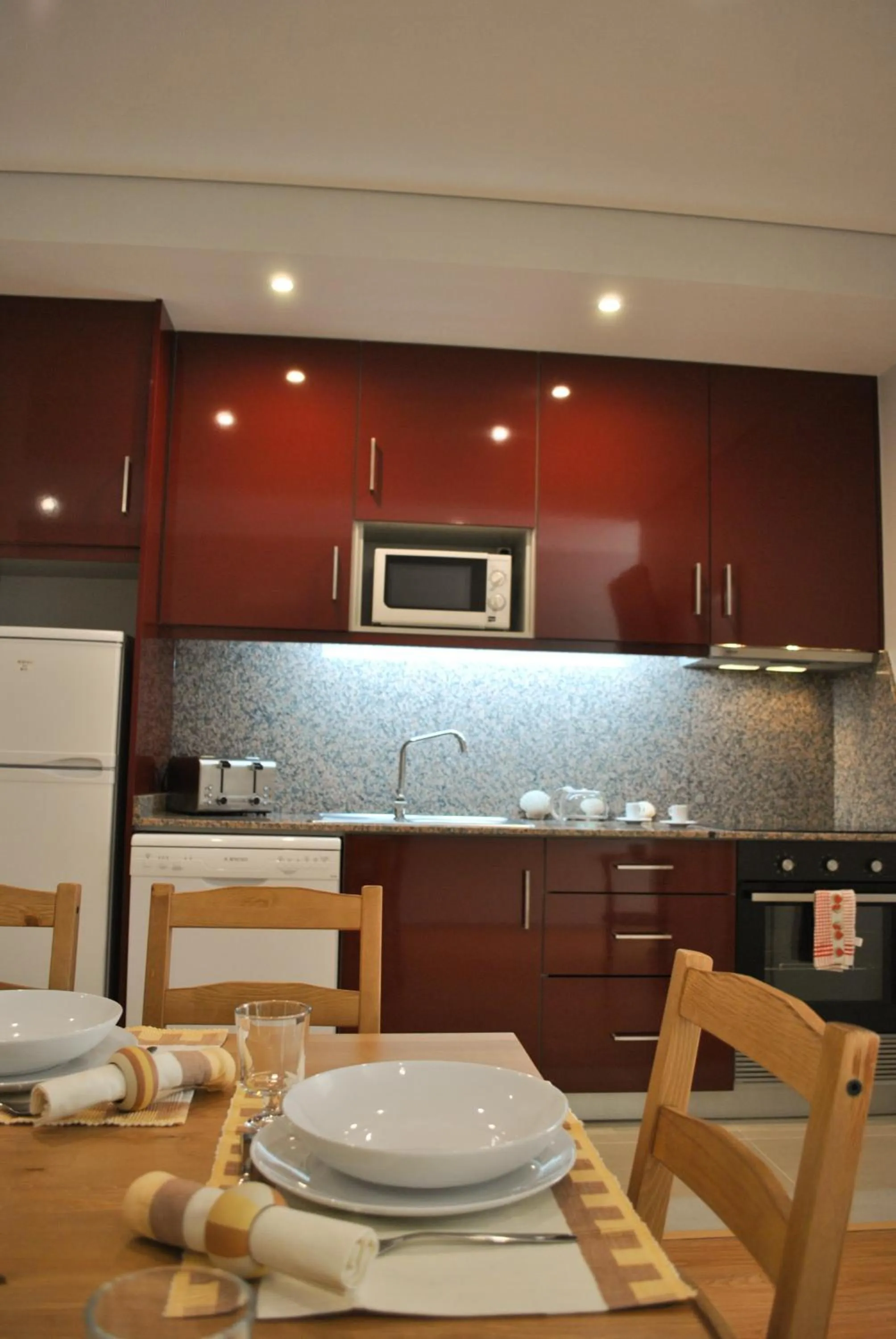 Kitchen or kitchenette in Apartamentos Portodouro - Santa Catarina