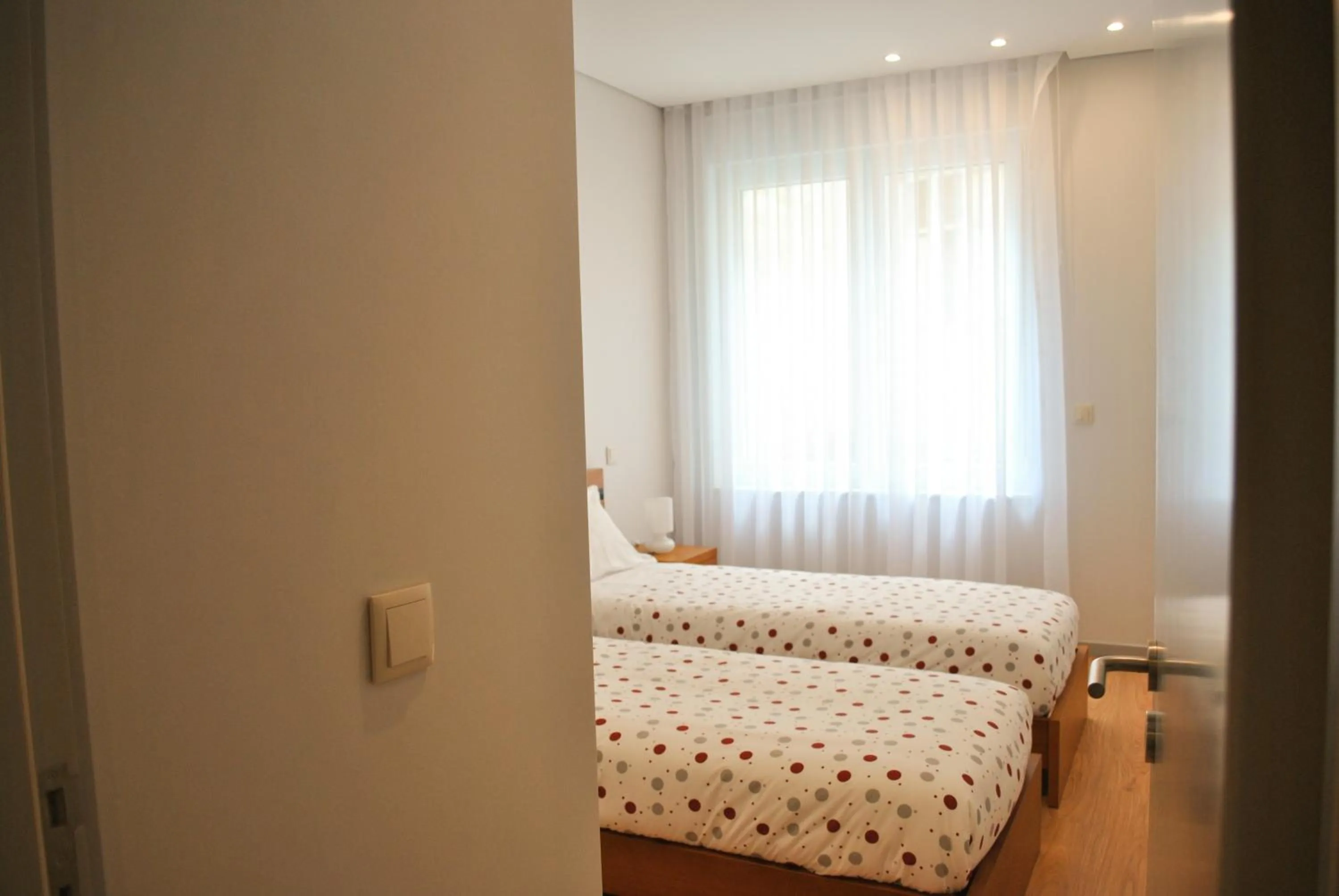 Bed in Apartamentos Portodouro - Santa Catarina