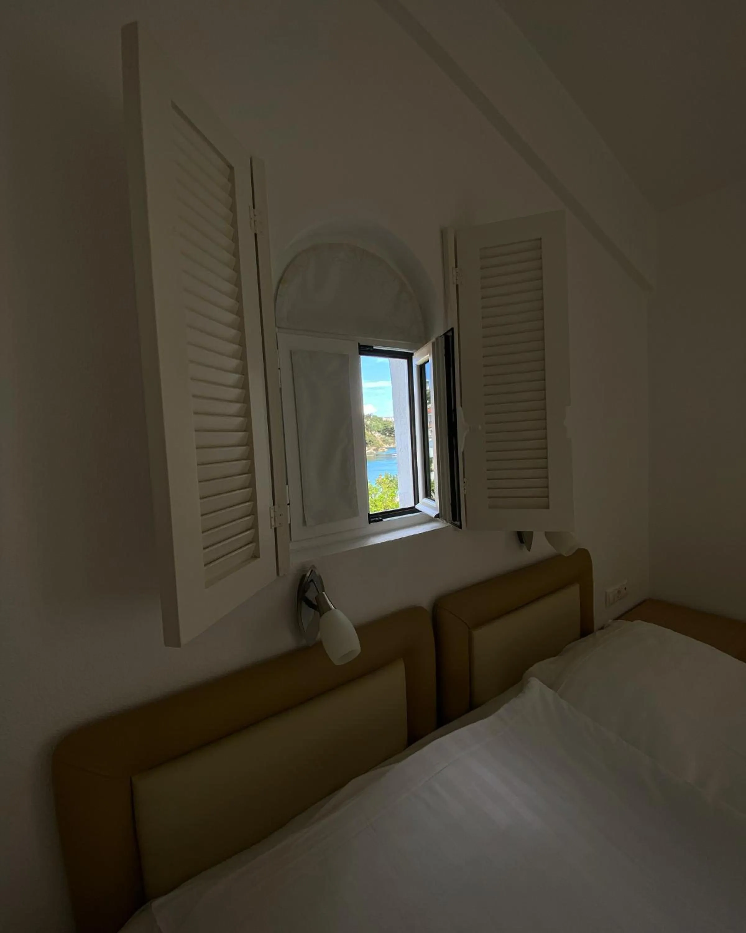 Bed in Anemoni Beach Hotel