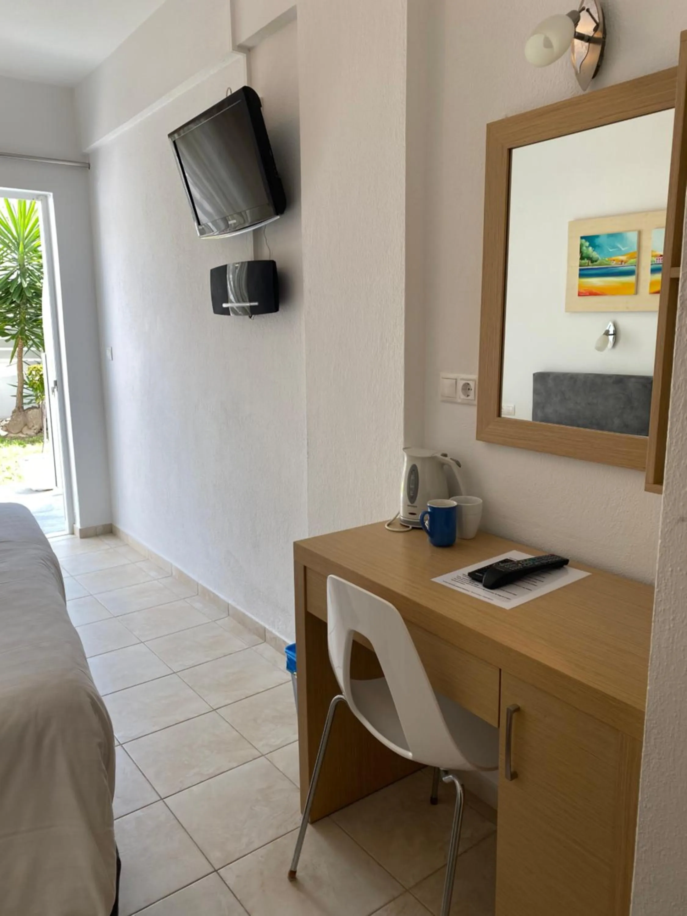 TV and multimedia in Anemoni Beach Hotel