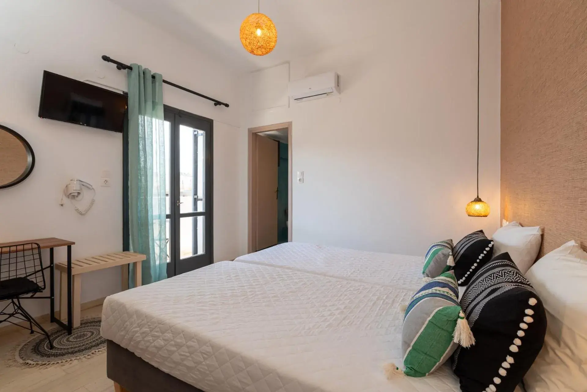 Bed in Anemos Inn by Estia Bed in Anemos Inn by Estia