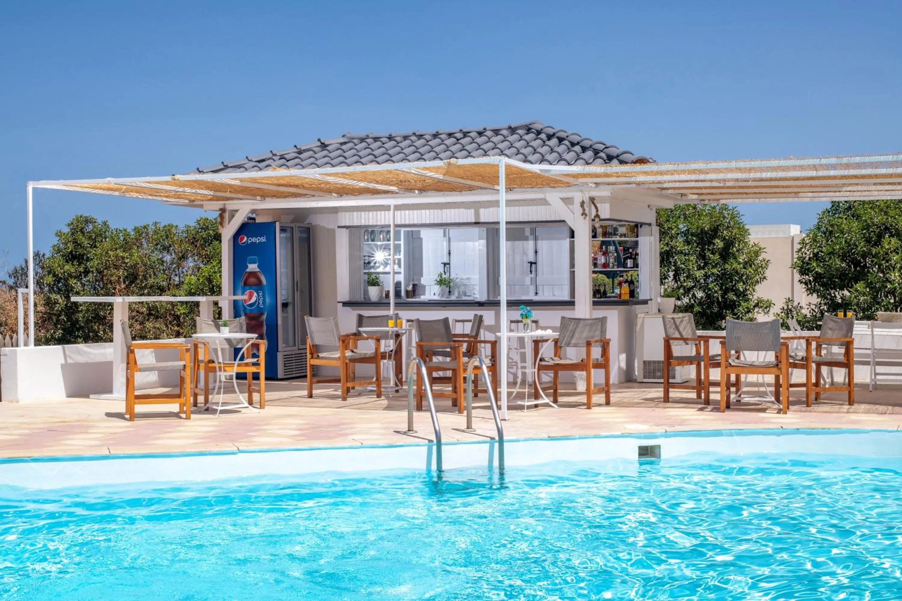 Swimming pool in Anemos Inn by Estia