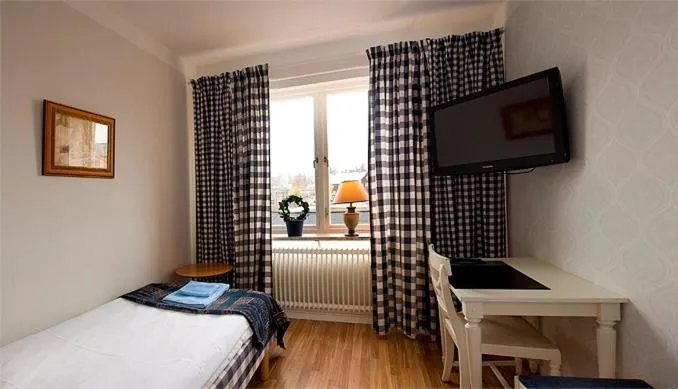 Photo of the whole room, Bed in Hotel Vännäs