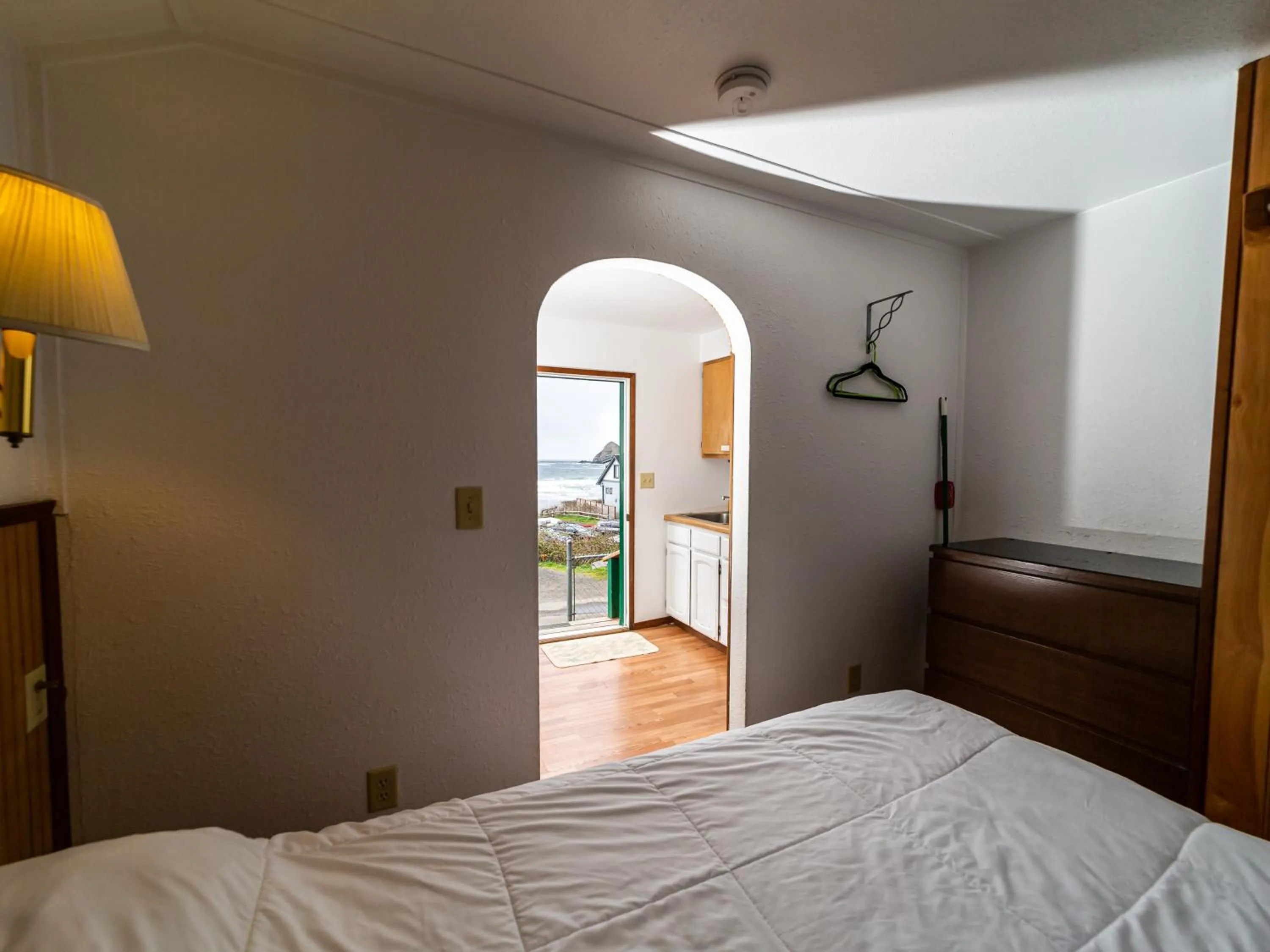 Bed in Oceanside Ocean Front Cabins