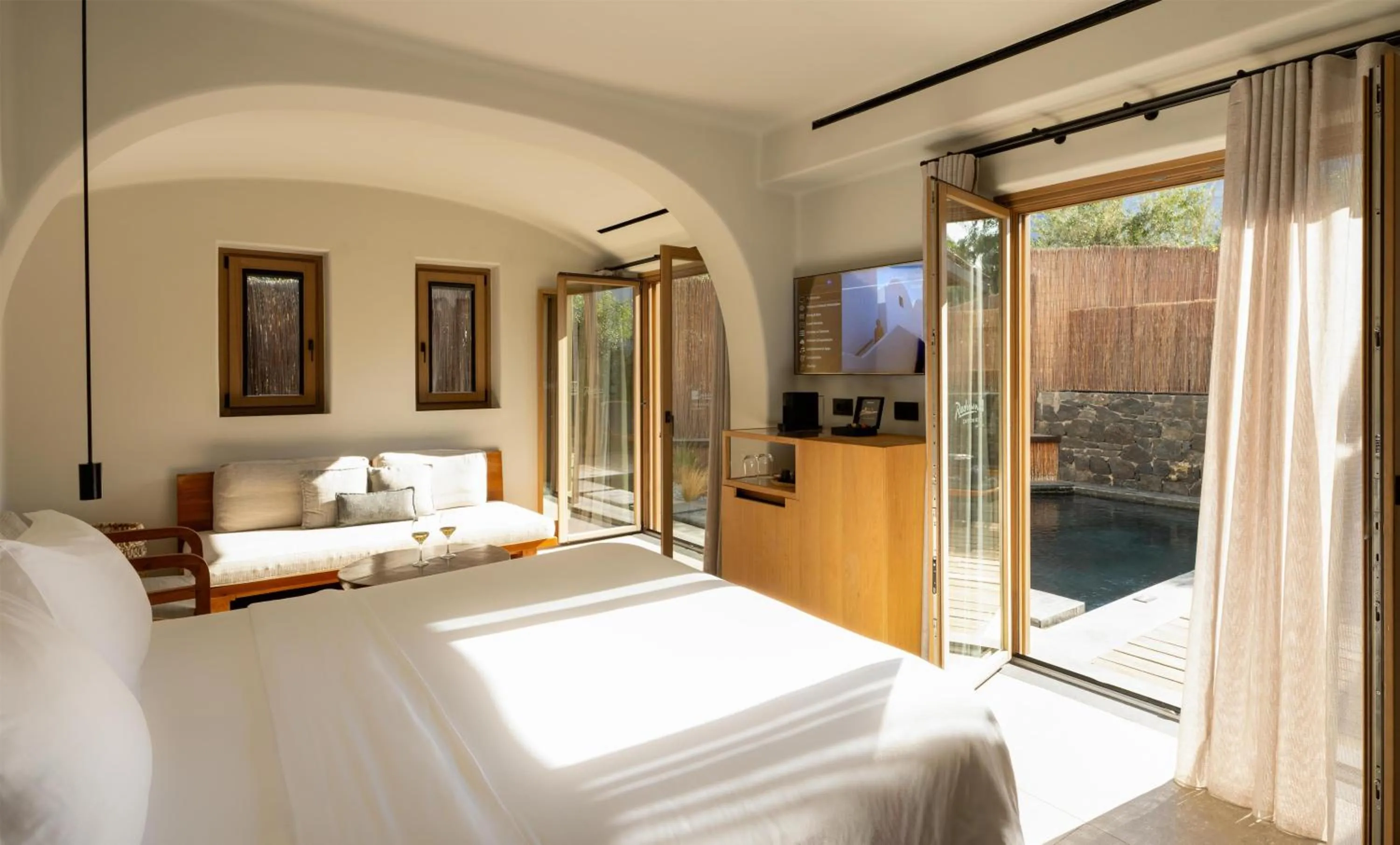 Photo of the whole room, Bed in Radisson Blu Zaffron Resort, Santorini