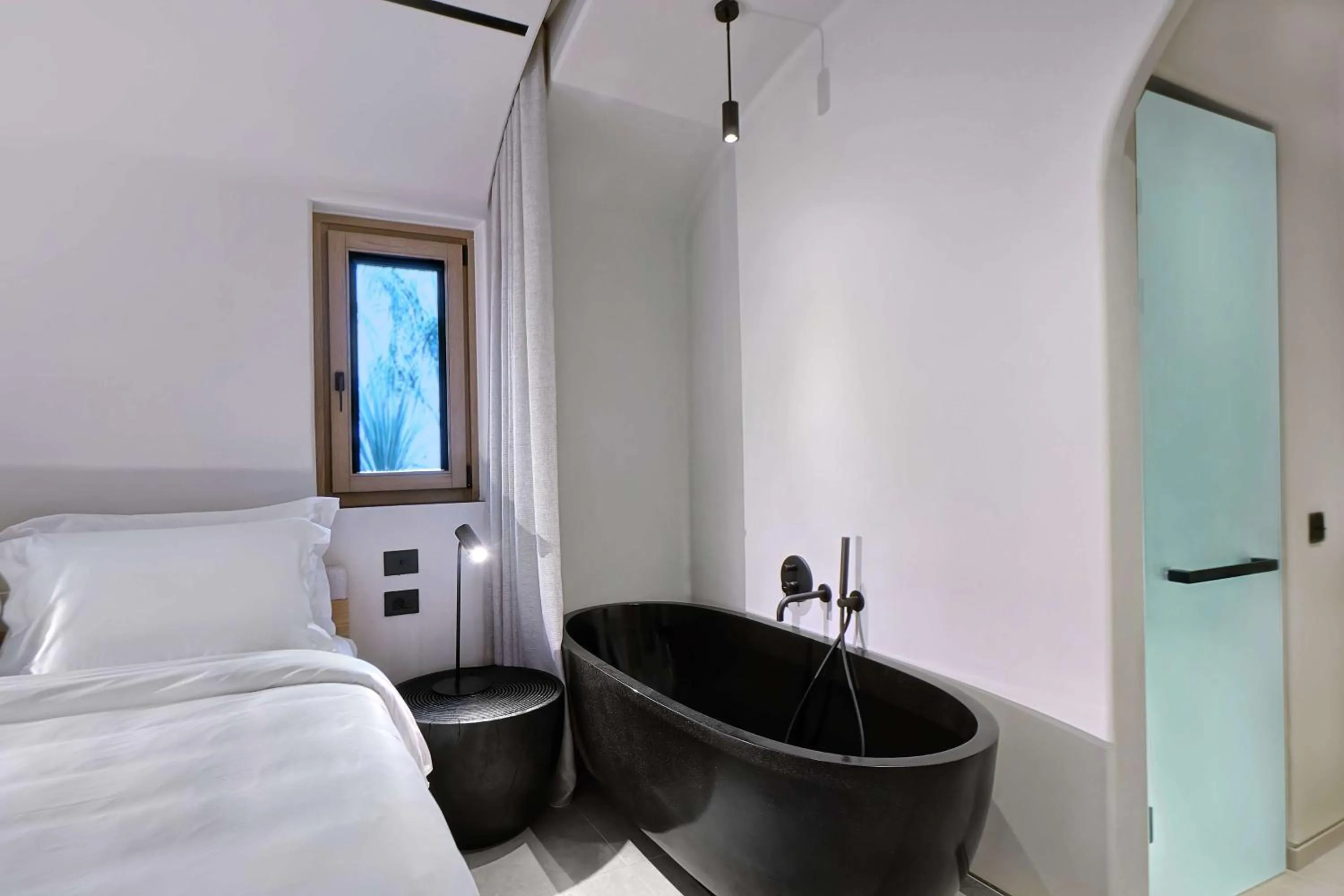 Photo of the whole room, Bed in Radisson Blu Zaffron Resort, Santorini