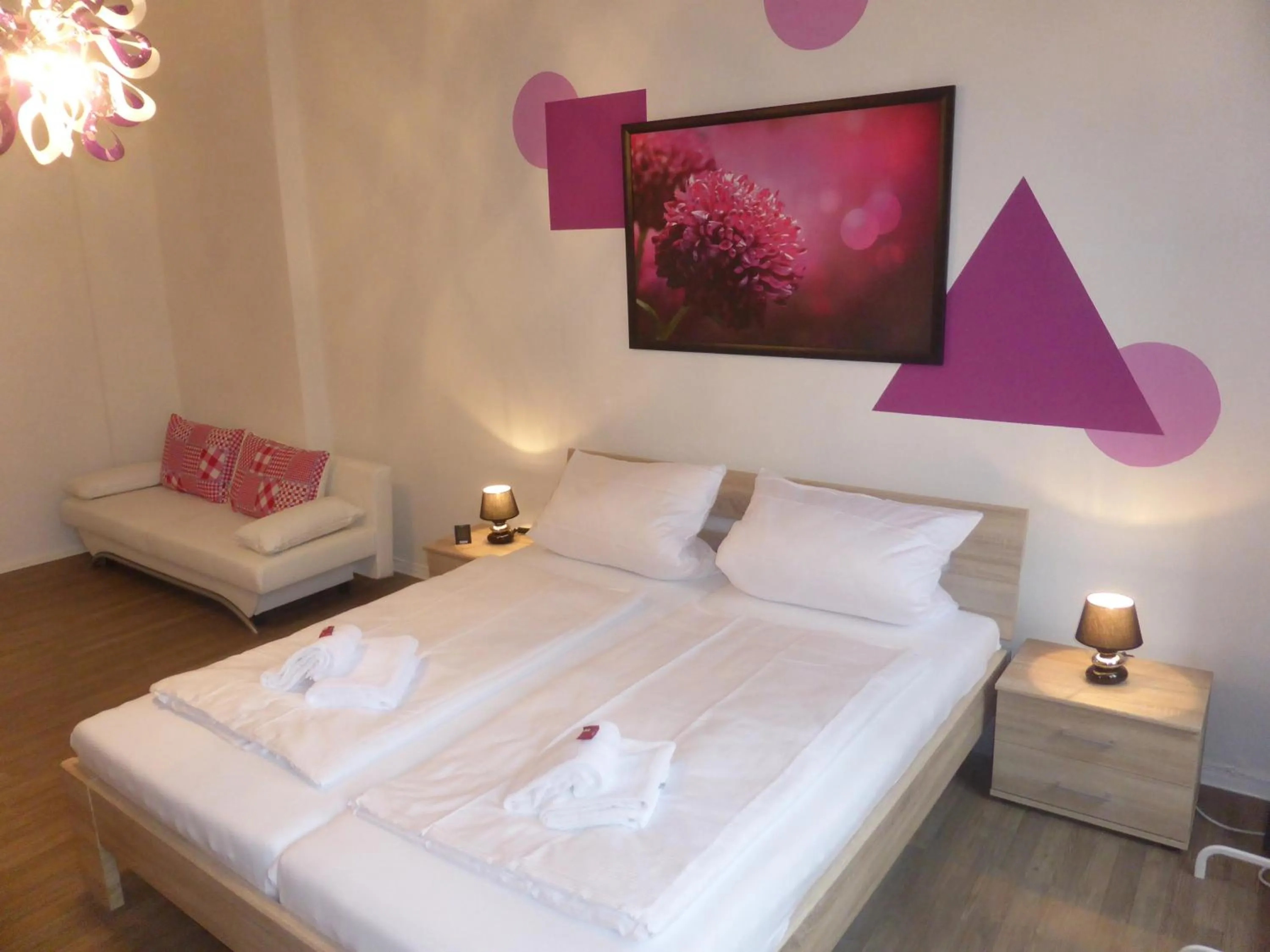 Bed in Apartments Dahlie & Nelke