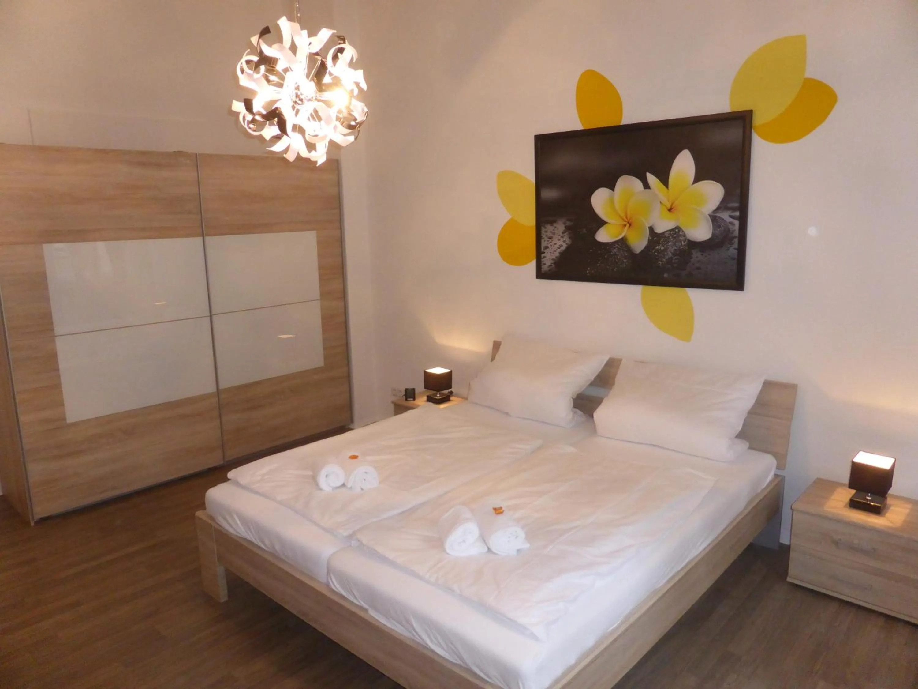 Bed in Apartments Dahlie & Nelke