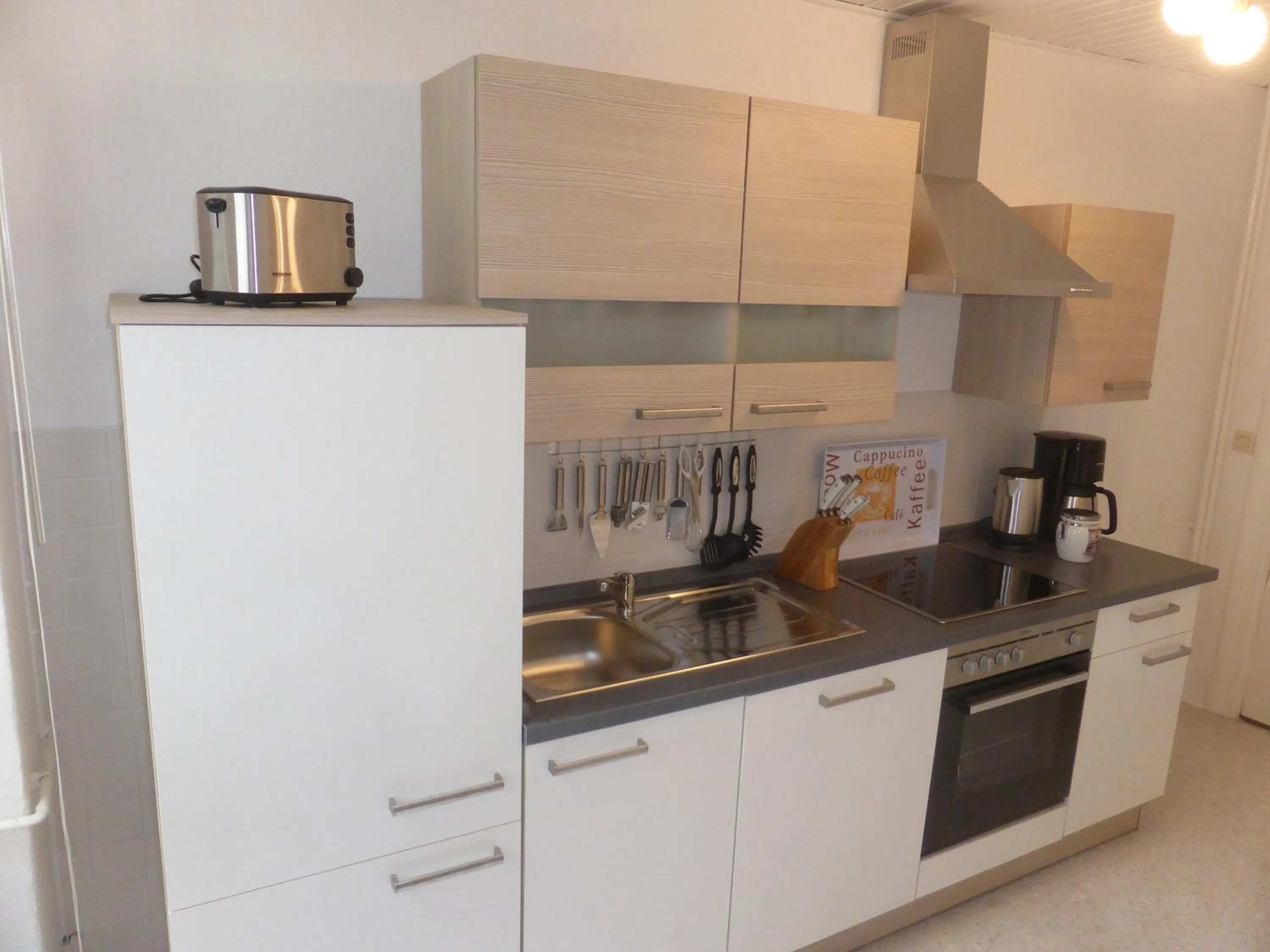 Kitchen or kitchenette in Apartments Dahlie & Nelke