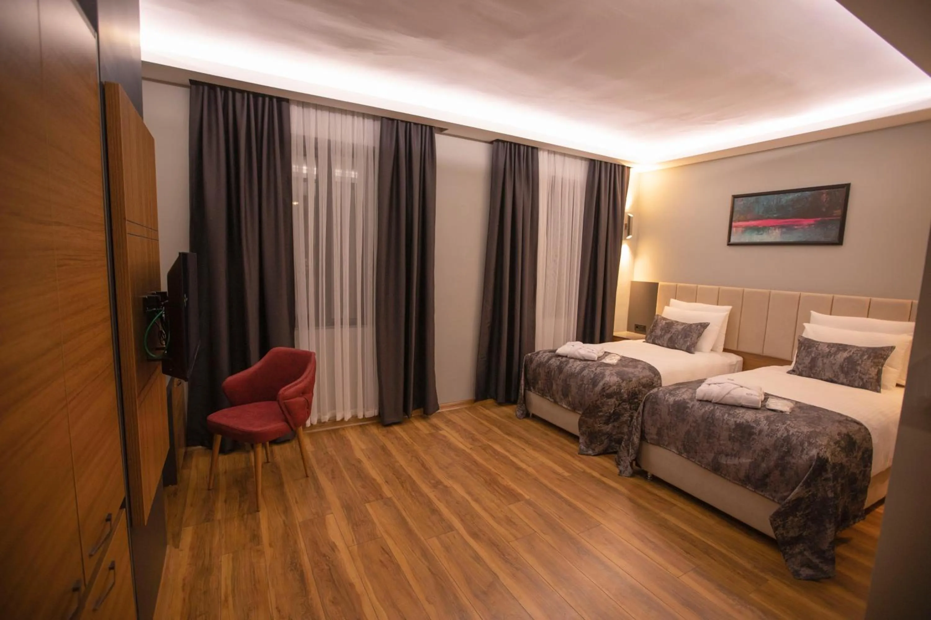 Bed in Divares Luxury Hotel