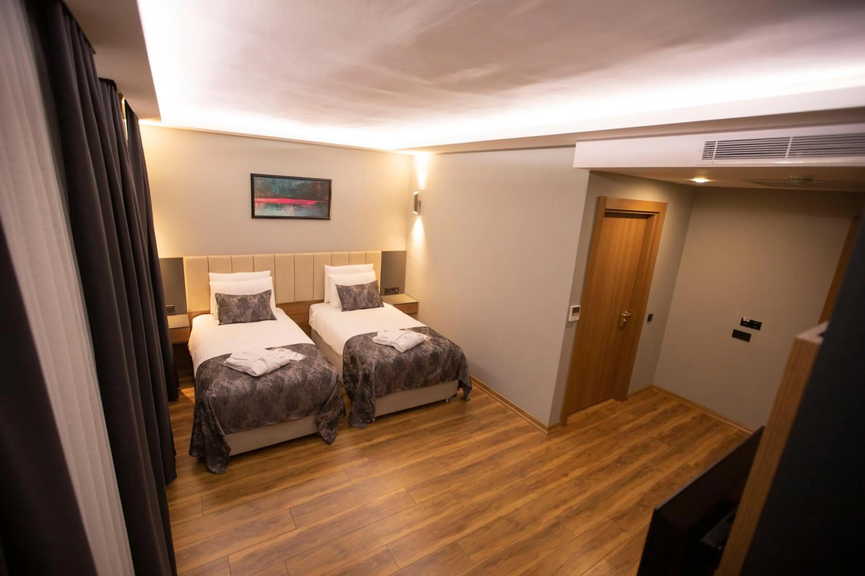 Bed in Divares Luxury Hotel