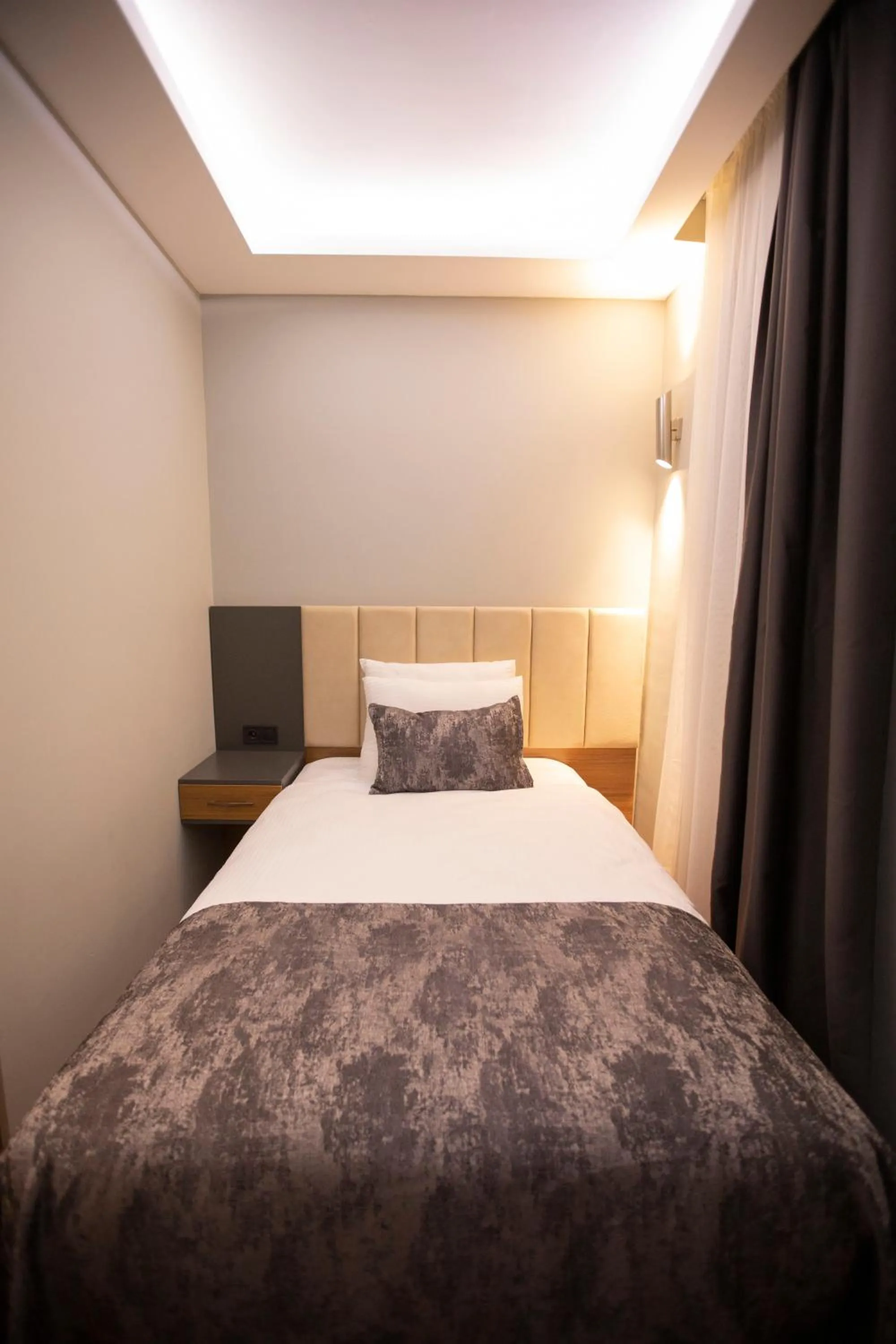 Bed in Divares Luxury Hotel