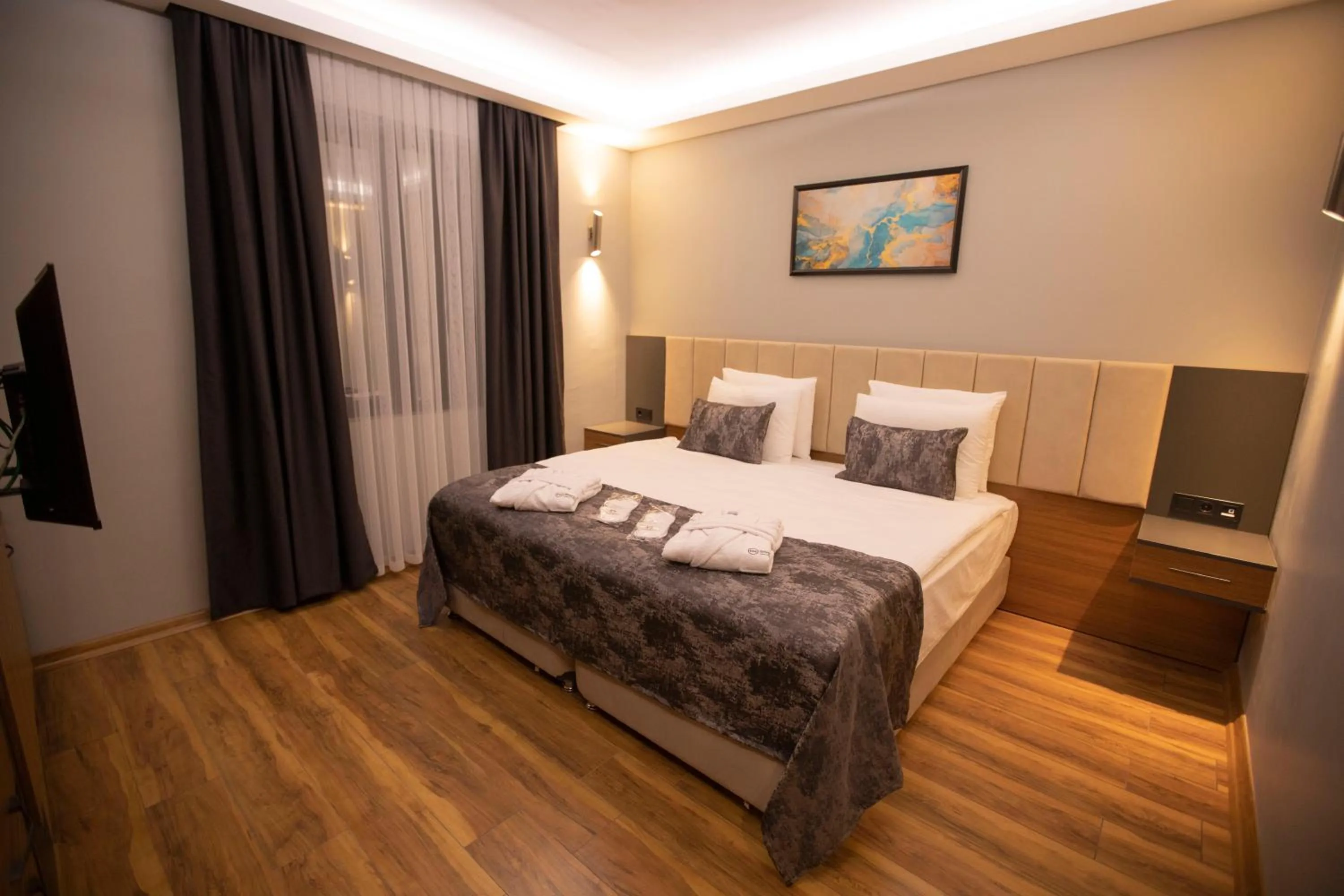 Bed in Divares Luxury Hotel