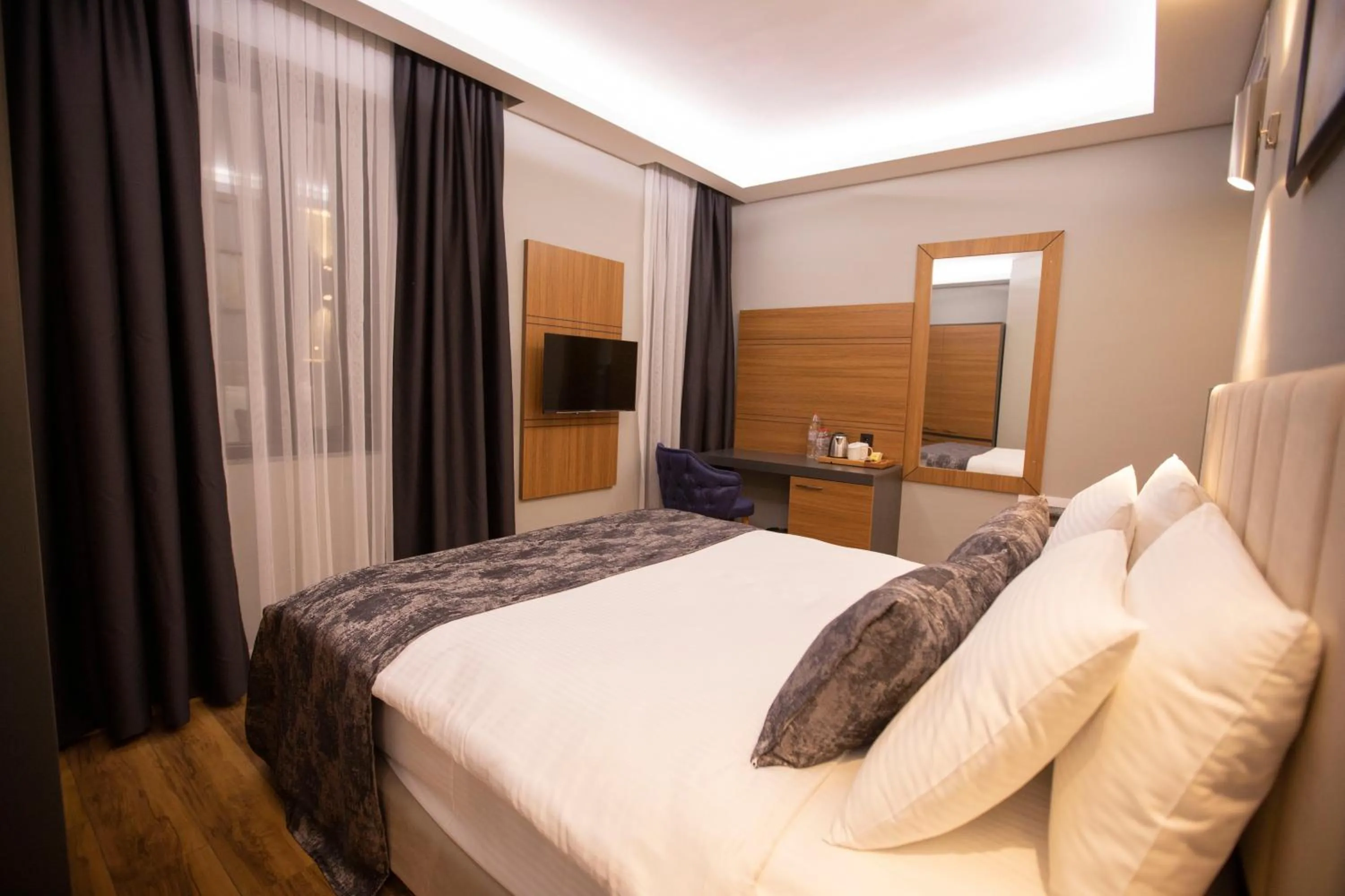 Bed in Divares Luxury Hotel