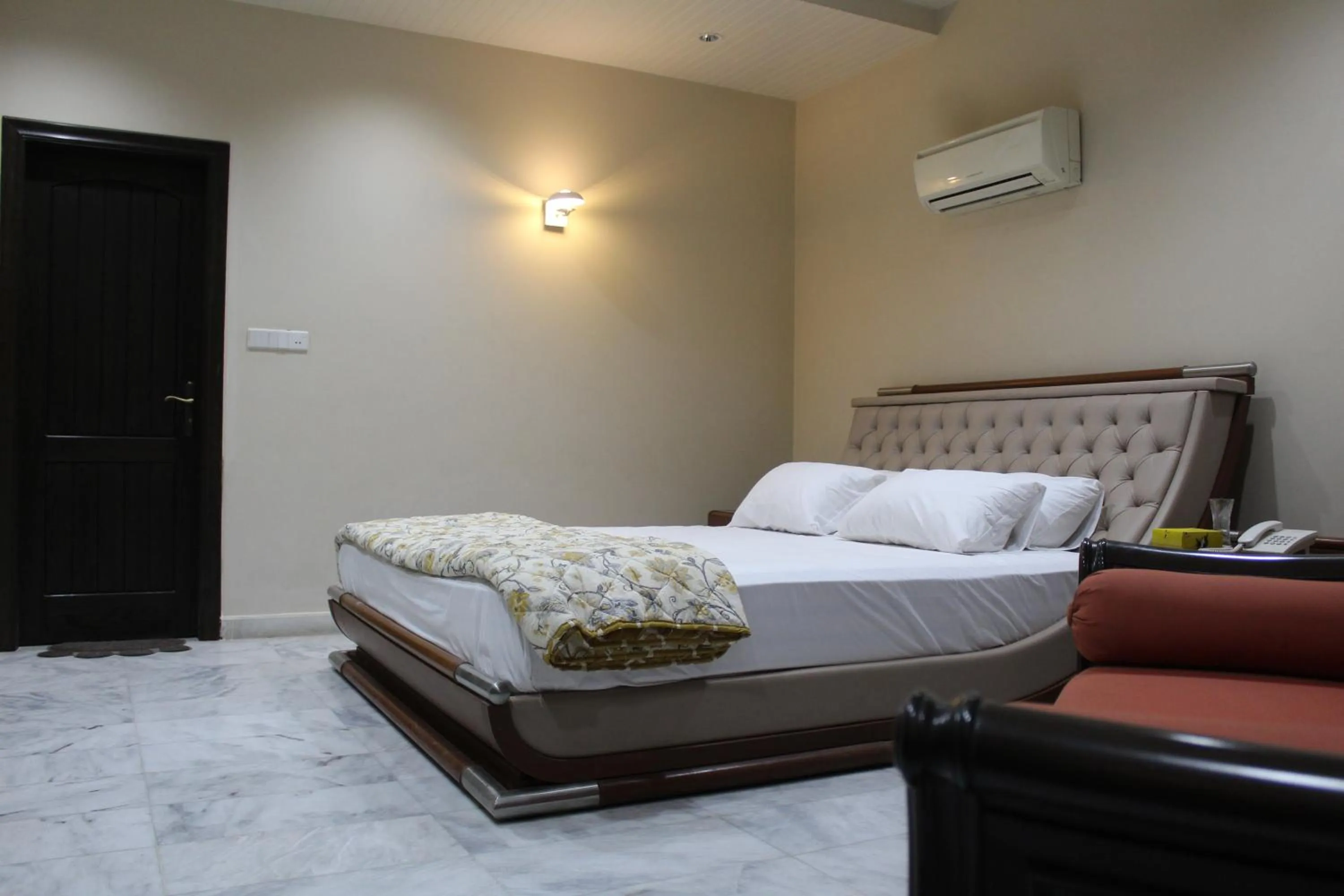Bed in HOTEL STATE RESIDENCY