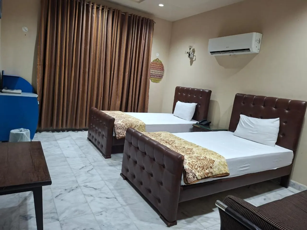 Bed in HOTEL STATE RESIDENCY