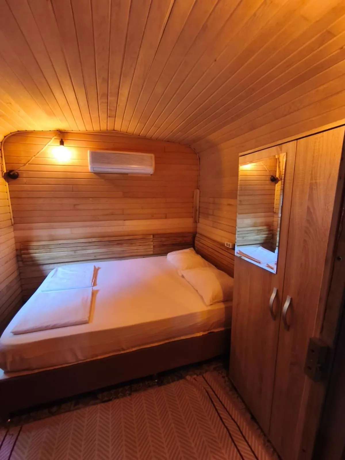 Bed in ORANGE BEACH CAMP