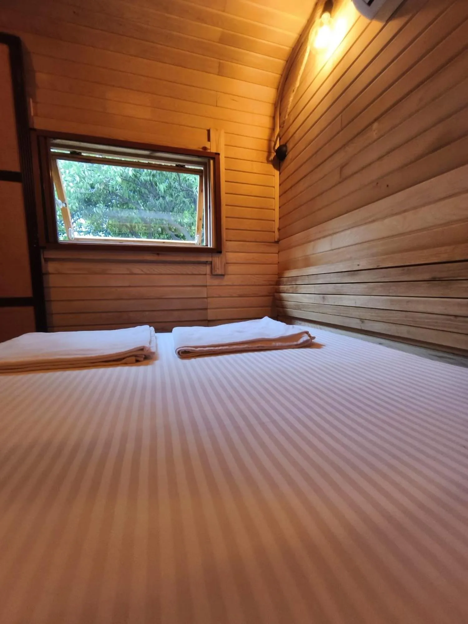 Bed in ORANGE BEACH CAMP