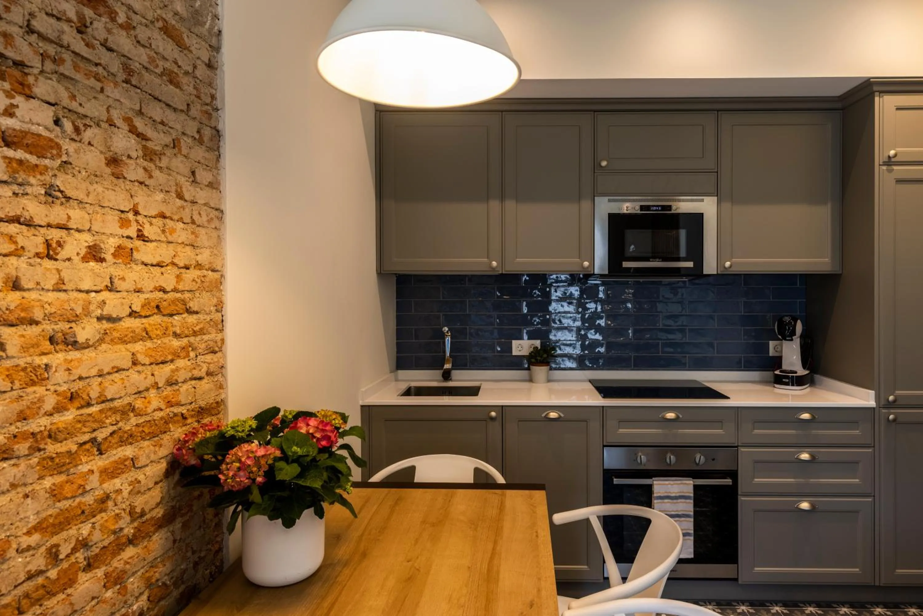 Kitchen or kitchenette in Apartamentos El Patio - Modernos con vistas en Plaza Mayor
