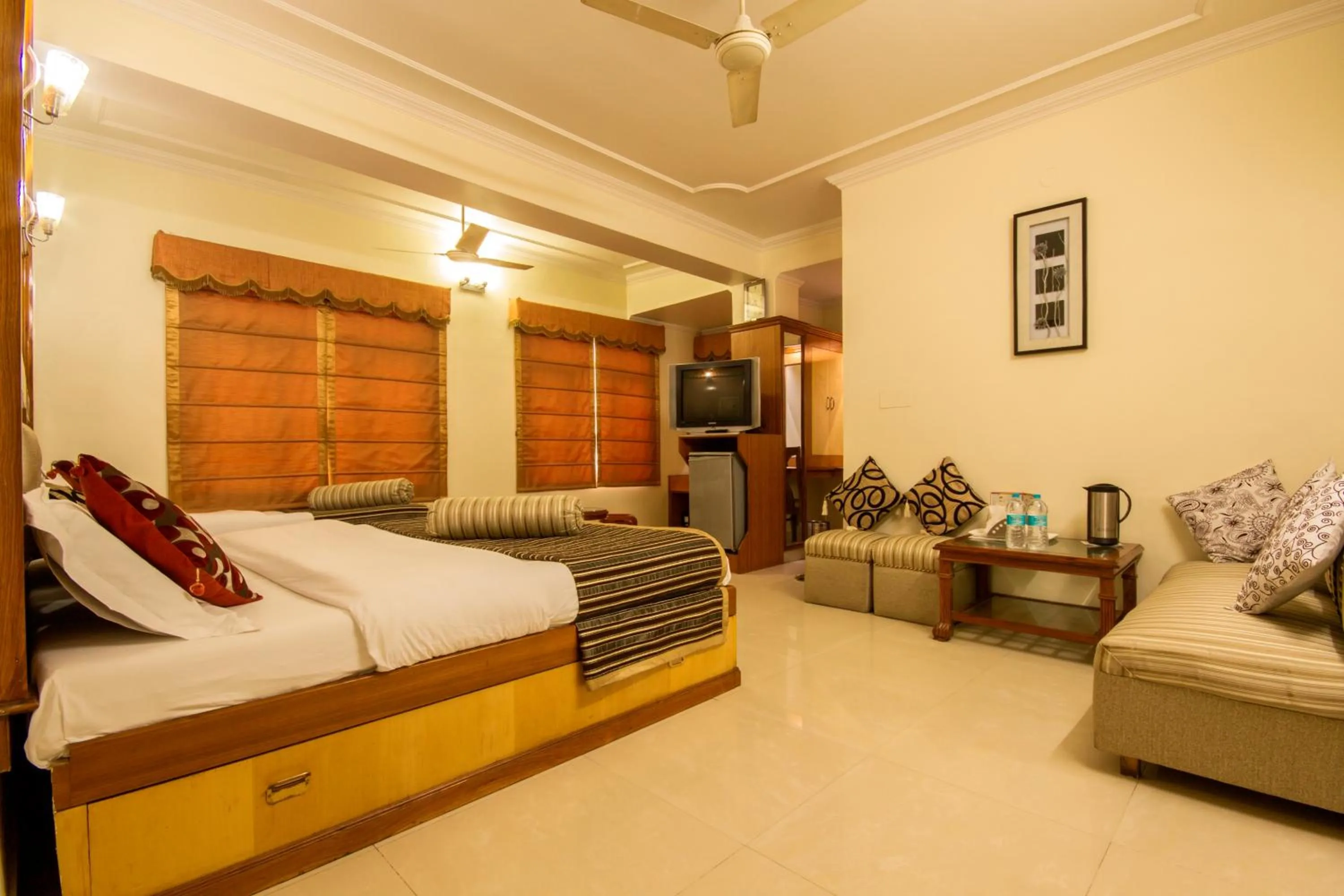 Photo of the whole room, Bed in The C Park Inn Karol Bagh Homely Atmosphere