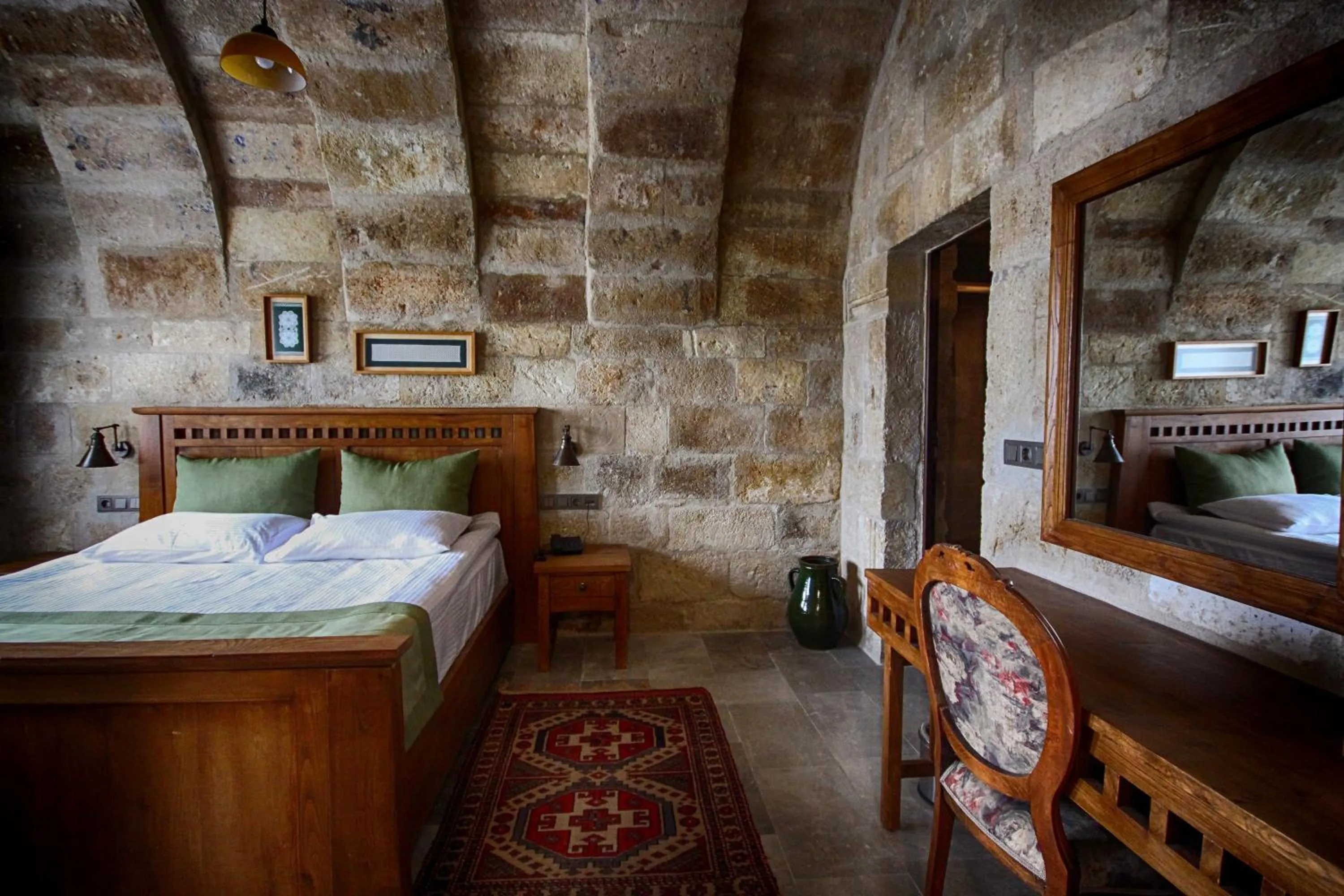 Bed in 1811 Cave Hotel