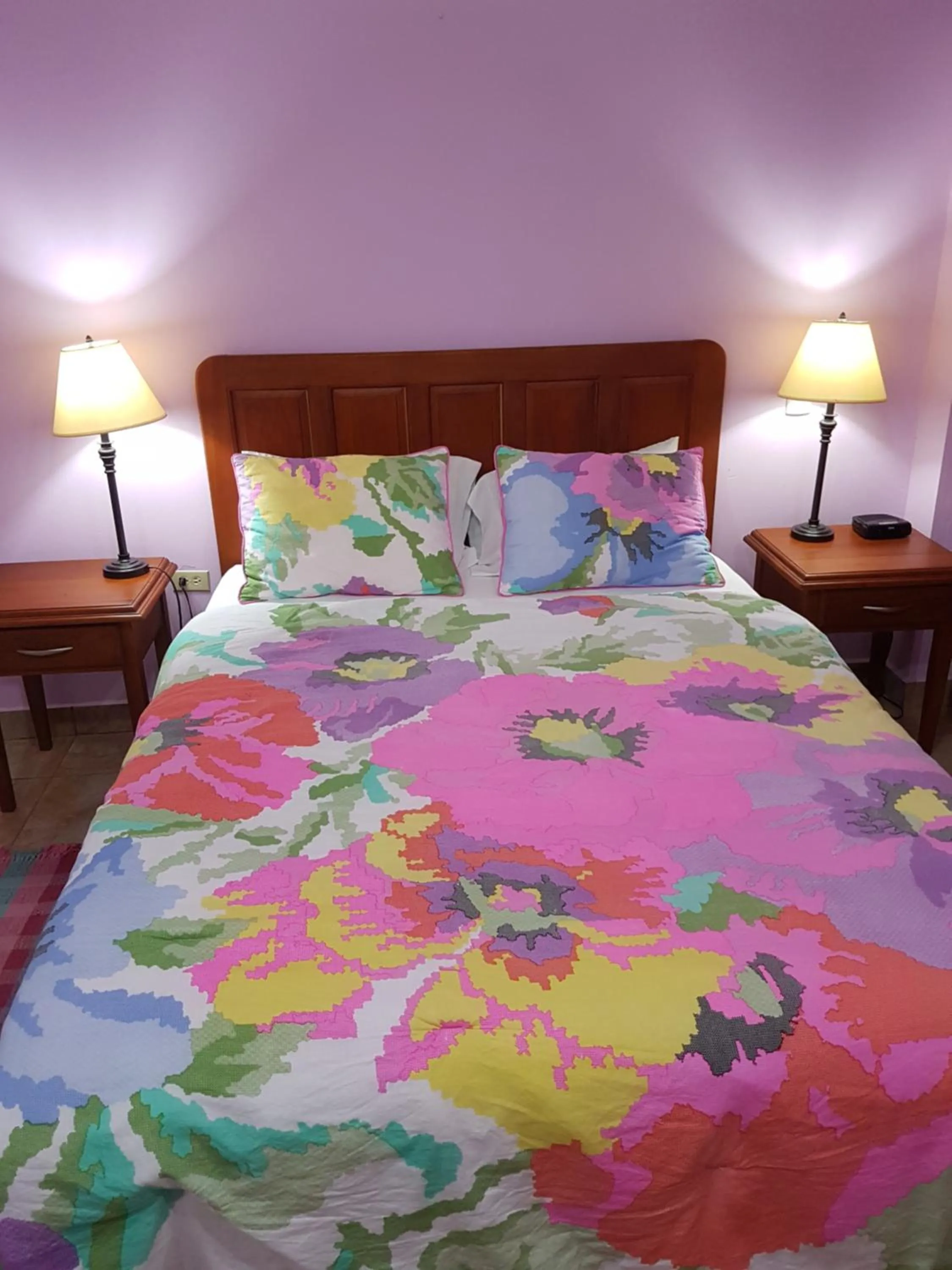 Bed in Piarco Village Suites
