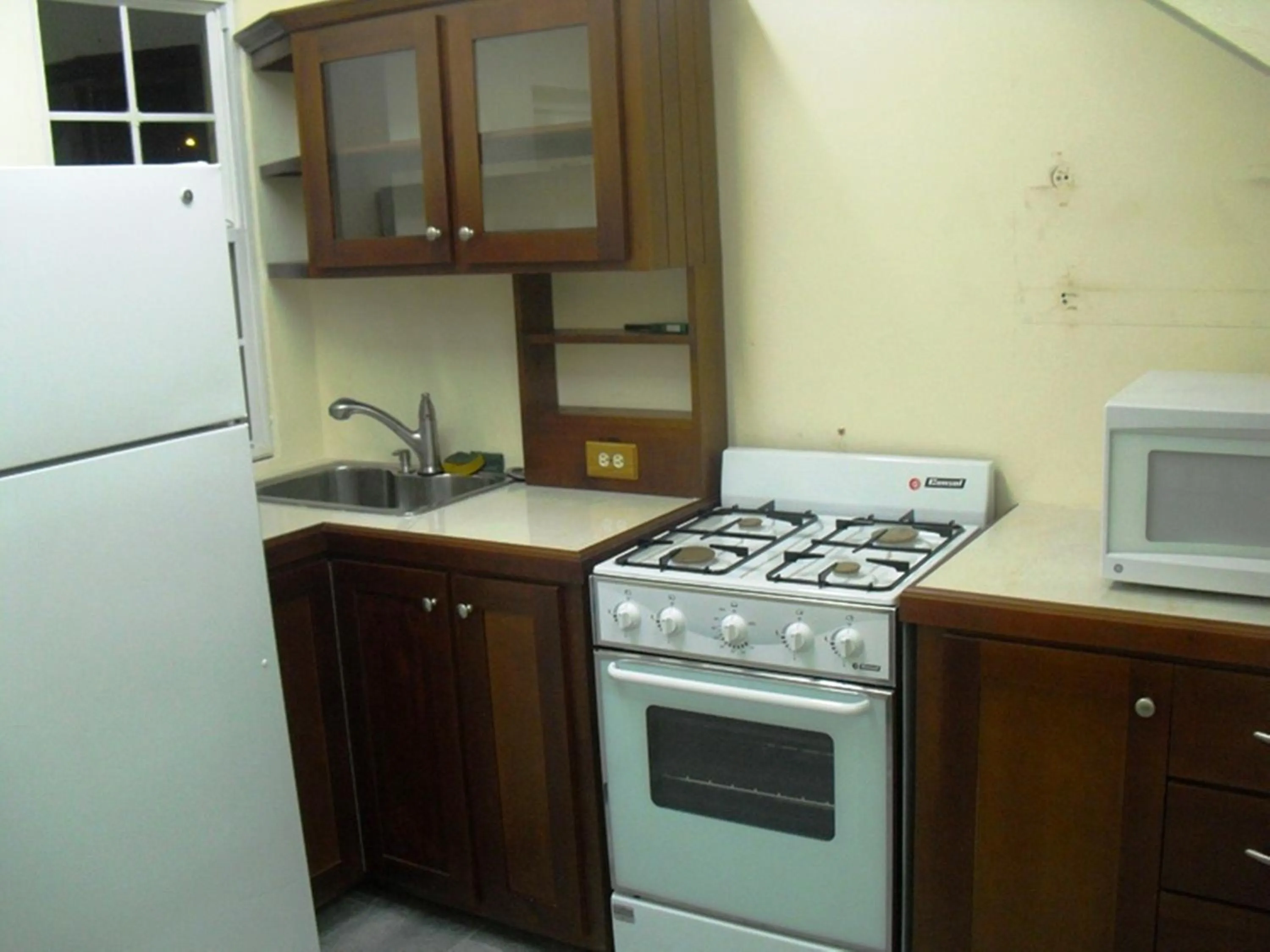Kitchen or kitchenette in Piarco Village Suites